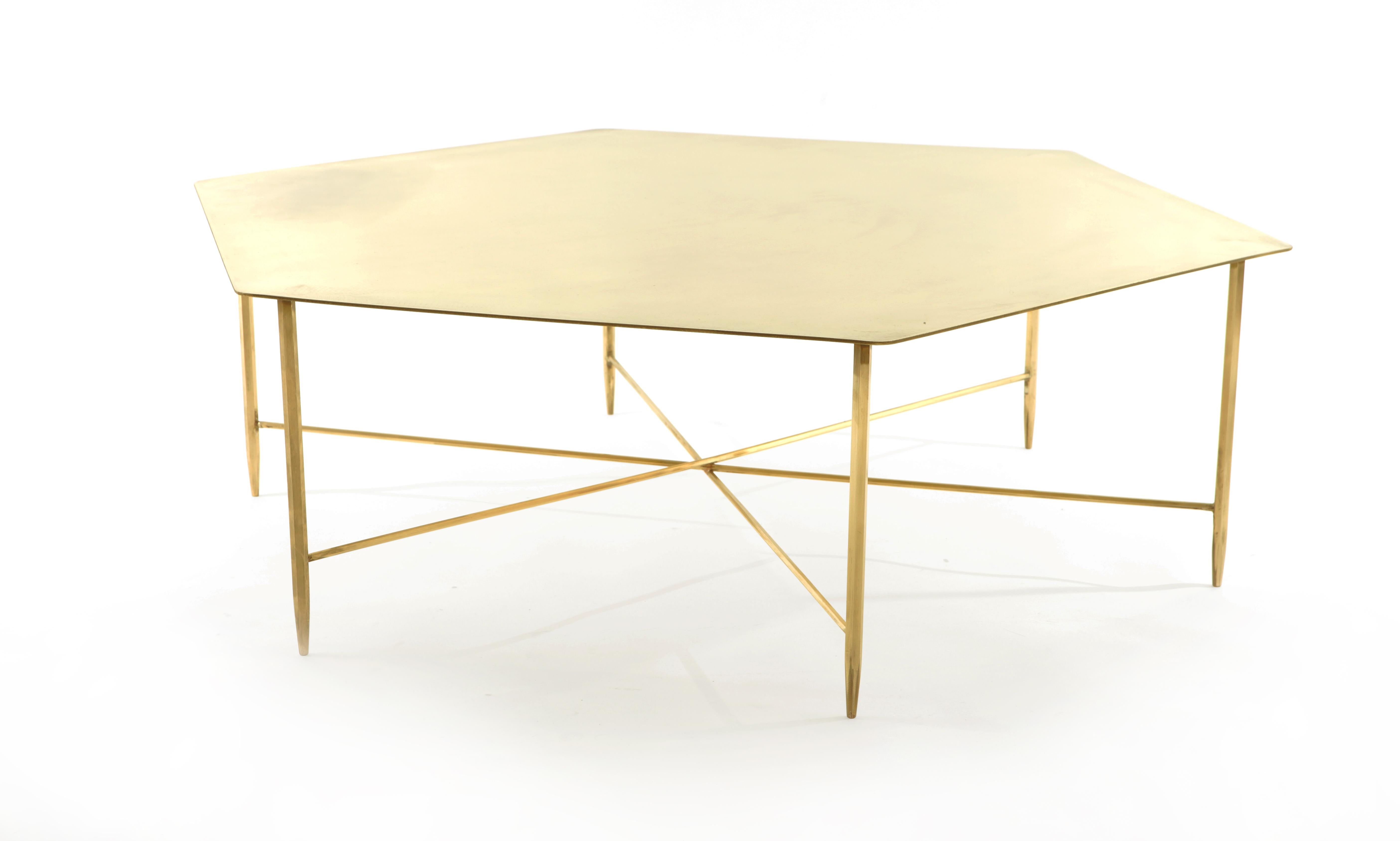 The discovery of hexagonal extruded profiles, commonly used in the boating industry, inspired the design of the luxurious brass tables of the Marina Collection. In true celebration of the hexagonal form, the elements of the table consist of the