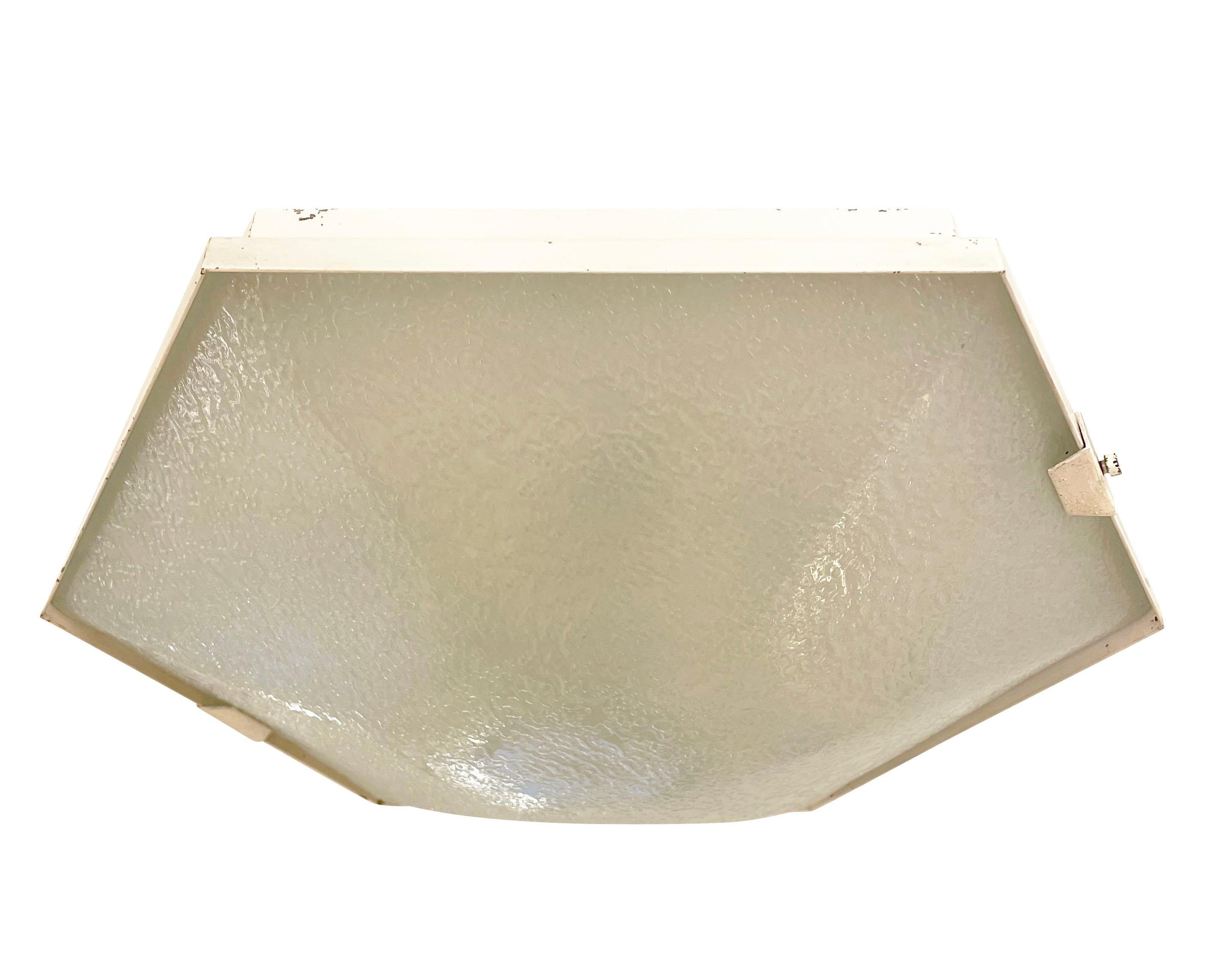 Hexagonal Stilnovo light which can be used as a flush mount or sconce. Beautifully molded textured glass with white framing. Holds six candelabra bulbs.

Condition: Excellent vintage condition, minor wear consistent with age and use 

Measures: