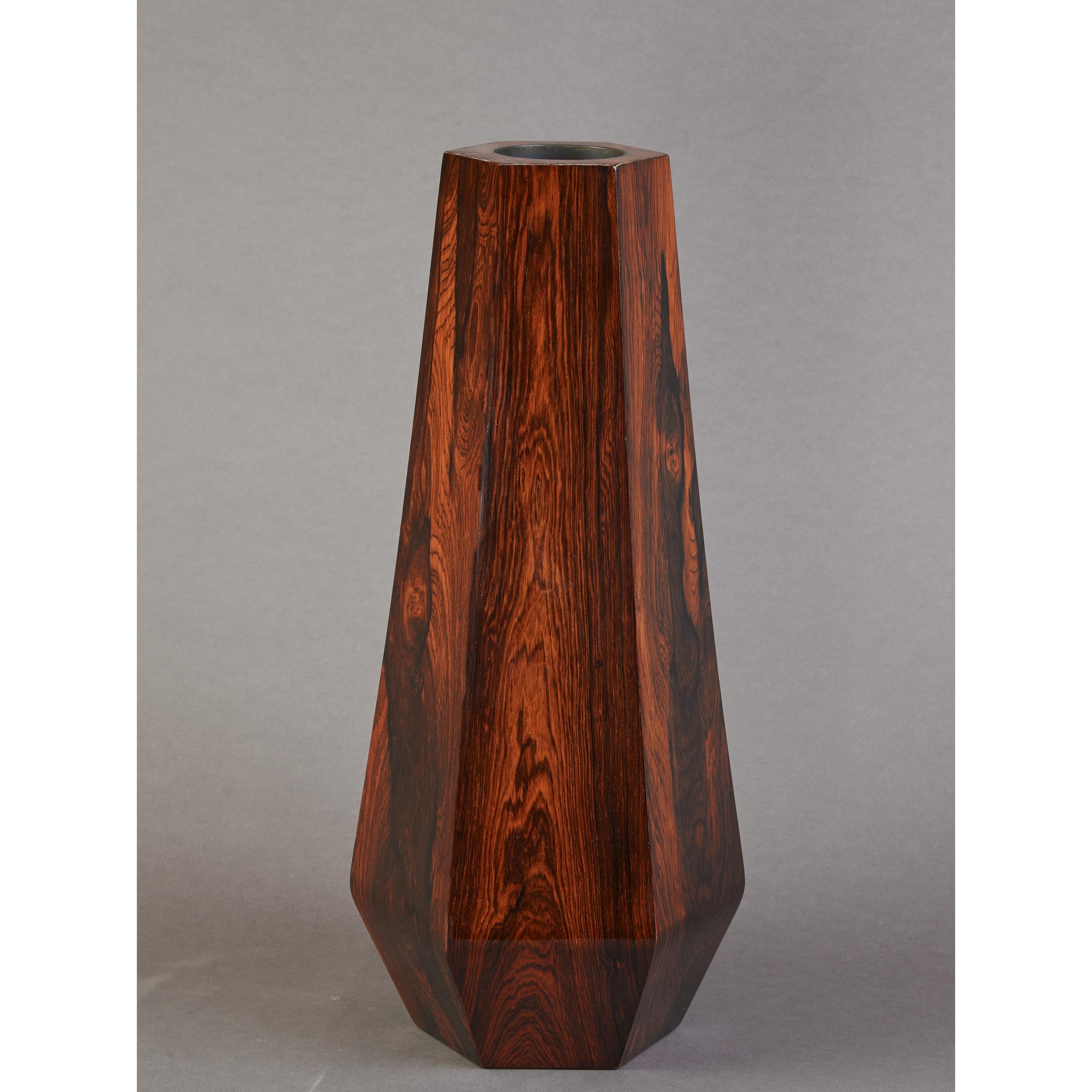 FRANCE, 1970's
Sculptural tall hexagonal tapered vessel, in richly veneered wood, beautifully grained and polished.
20 H x 10 W.