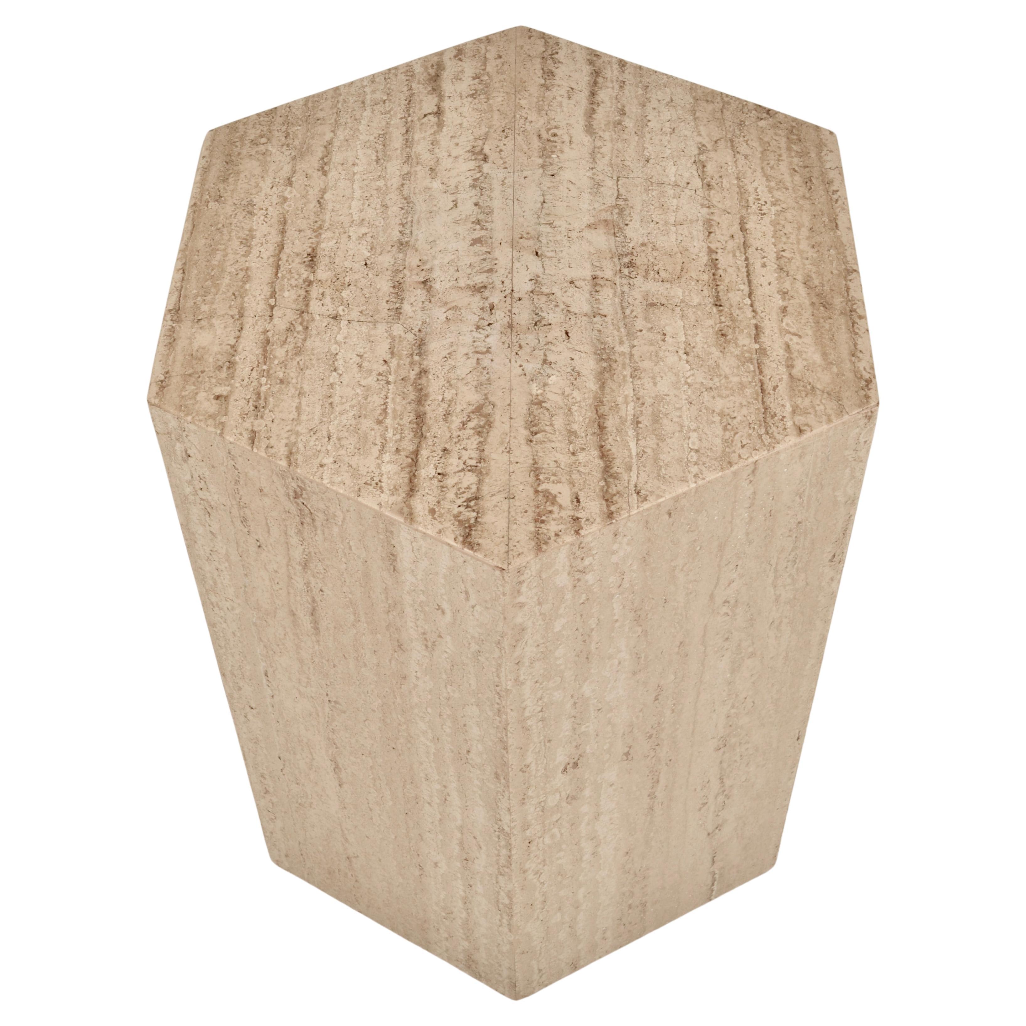 Simple hexagonal form table in Italian travertine marble. This example if very clean. Lovely coloration in the stone. Original felt under-cover. 