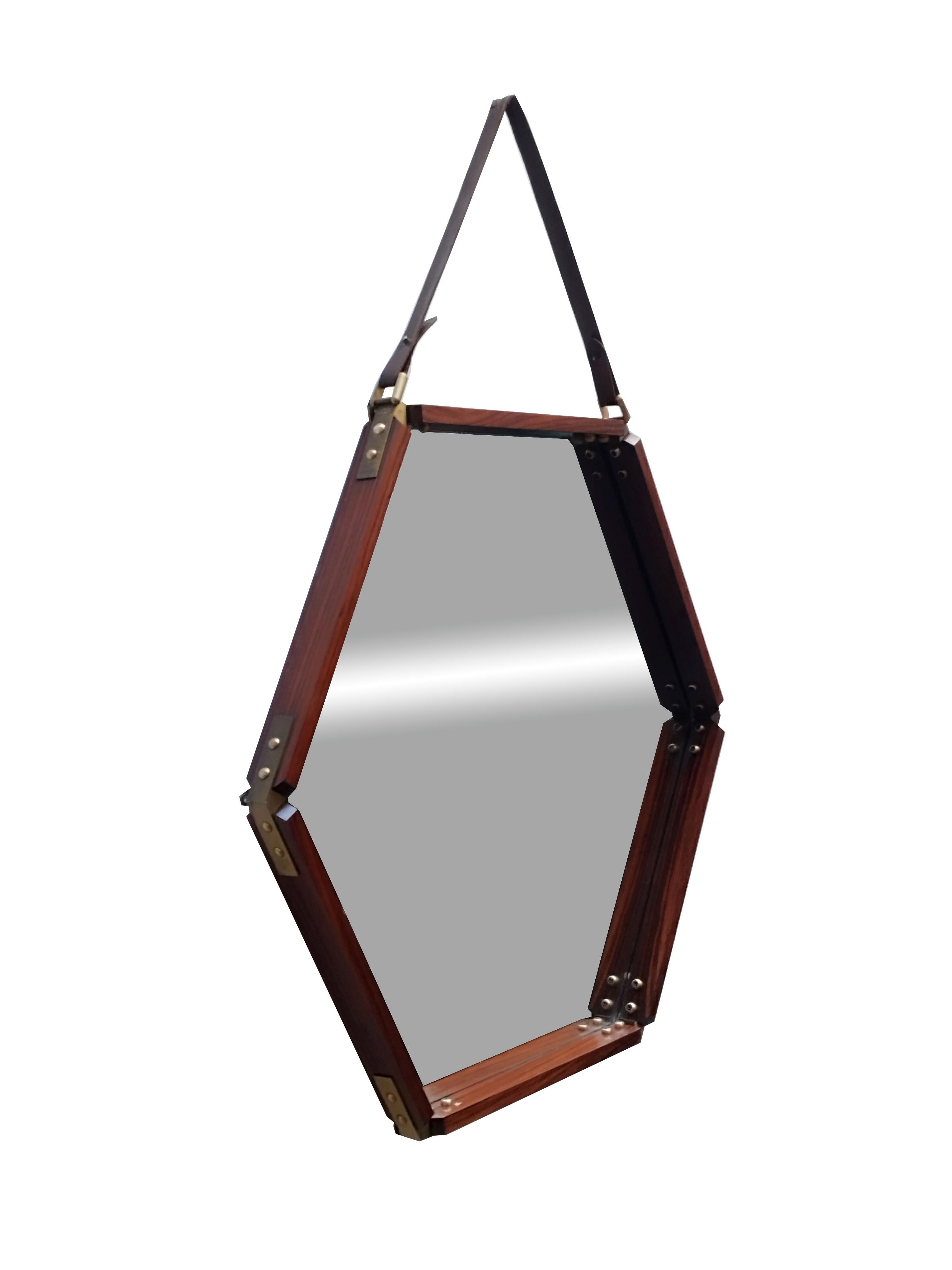 Hexagonal mirror with teak frame, brass inserts and original leather strap, mirror is in perfect condition, patina. Italian manufacture 1960