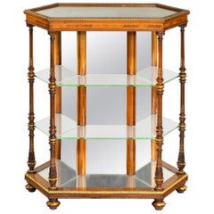 Hexagonal walnut display table attributed to Holland and Sons