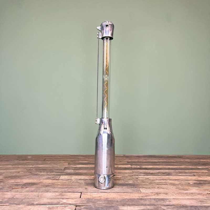 A stunning example of a vintage industrial floor lamp by Heyes of Wigan. Salvaged from factories in the UK, these lamps have been professionally restored with new electrical components and fitted with Edison LED filament tubes.  

Heyes of Wigan