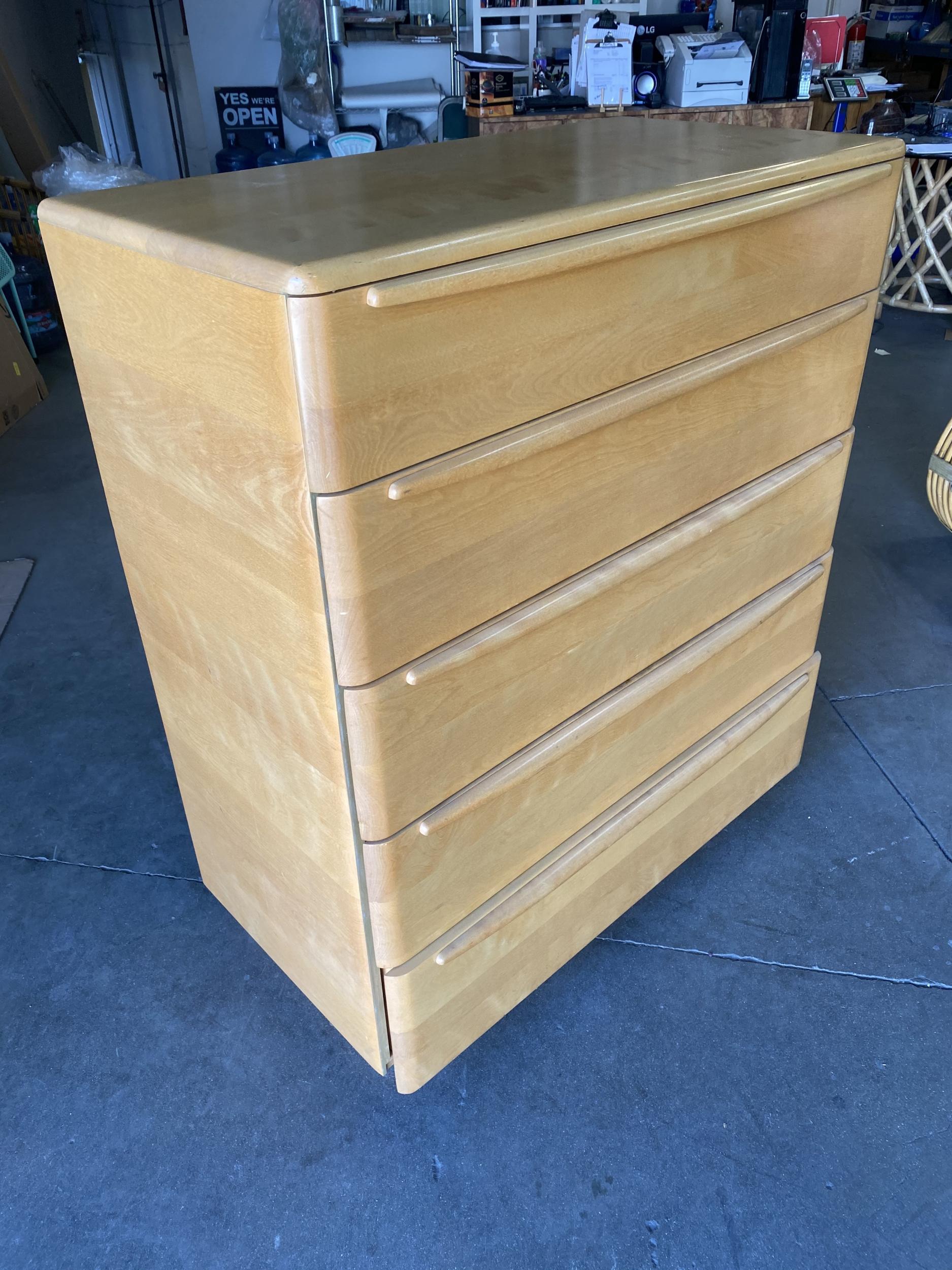 Blonde maple highboy dresser featuring the 