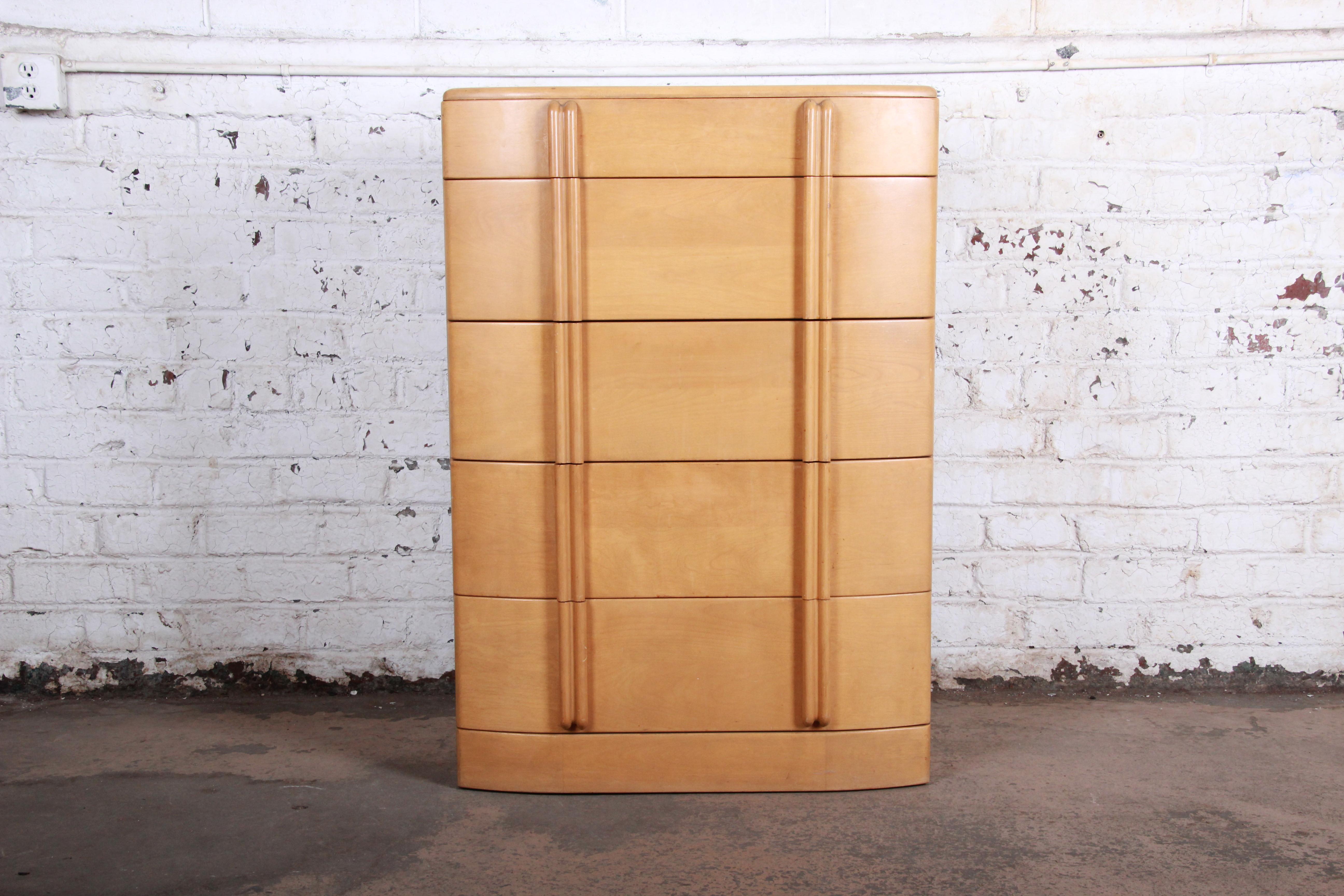 A gorgeous solid maple Art Deco style highboy dresser from the 