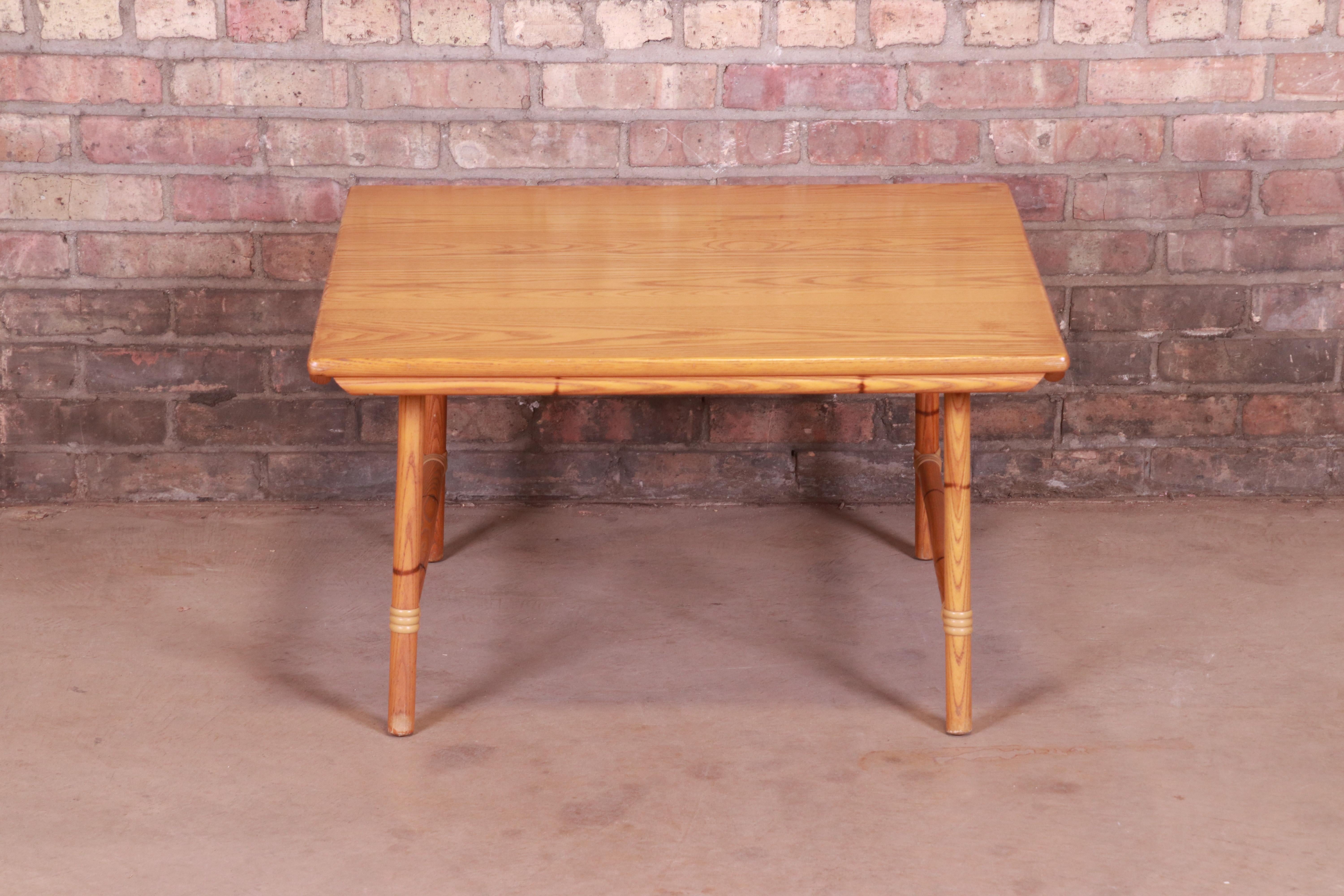 A gorgeous Mid-Century Modern Hollywood Regency chinoiserie square coffee table

By Heywood Wakefield

USA, 1950s

Solid ash top, with bamboo form legs and stretchers.

Measures: 30.25