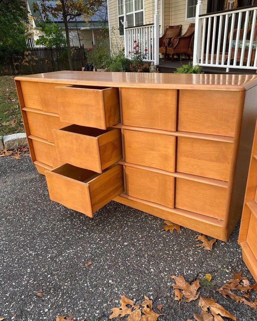 Heywood Wakefield Sculptura Bedroom set. Designed in the 1950'S, by Herrmann /Jiranek. Iconic 4-piece mid century set, crafted of solid maple wood and features sculpted ribbon design drawer fronts with integrated handles. Clean lines. Original
