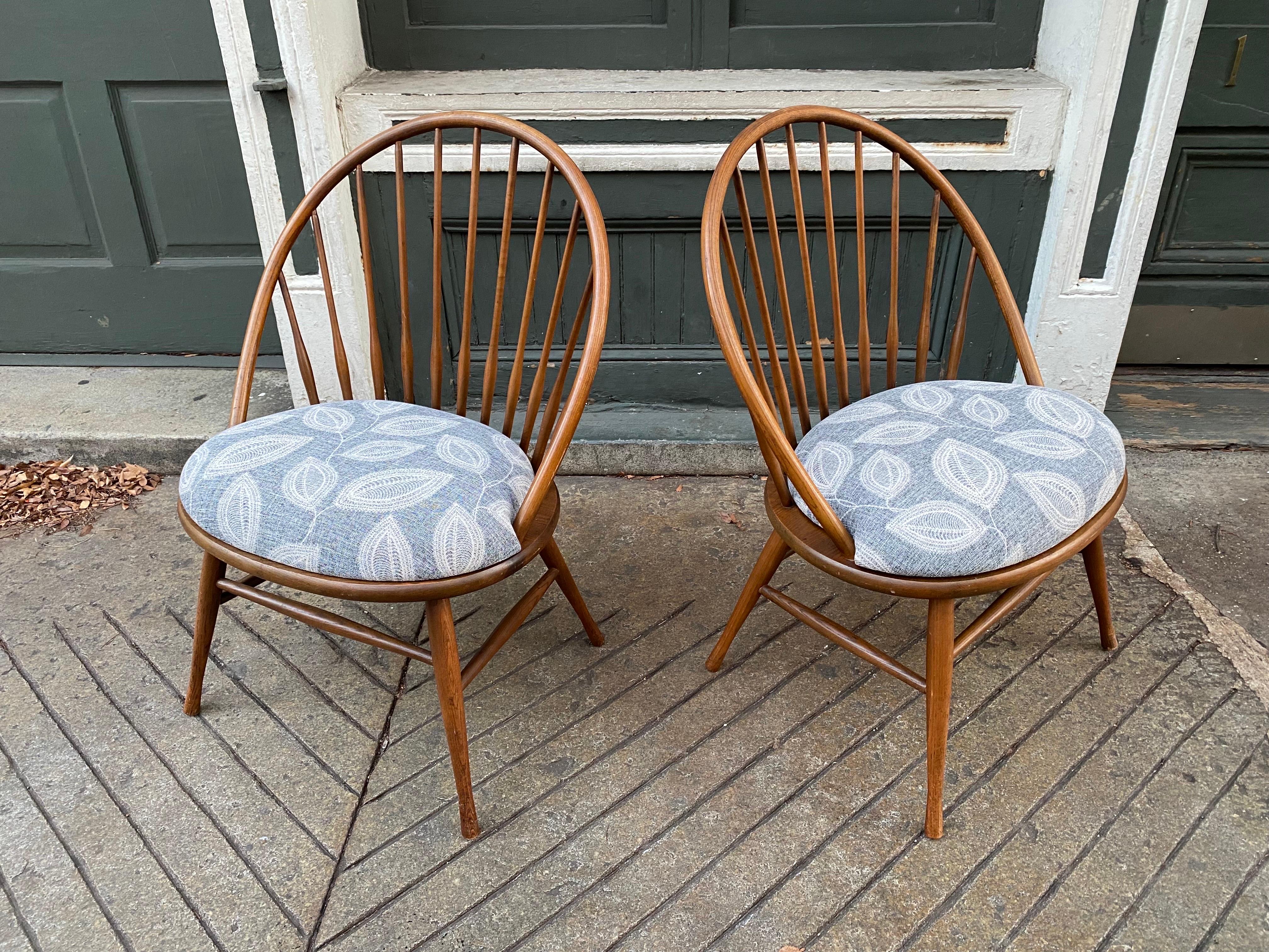 Pair of Heywood Wakefield Danish Inspired Lounge Chairs.  Newly upholstered seat cushions!  Very comfortable with a small footprint.  Curved bentwood back done in a modern way!