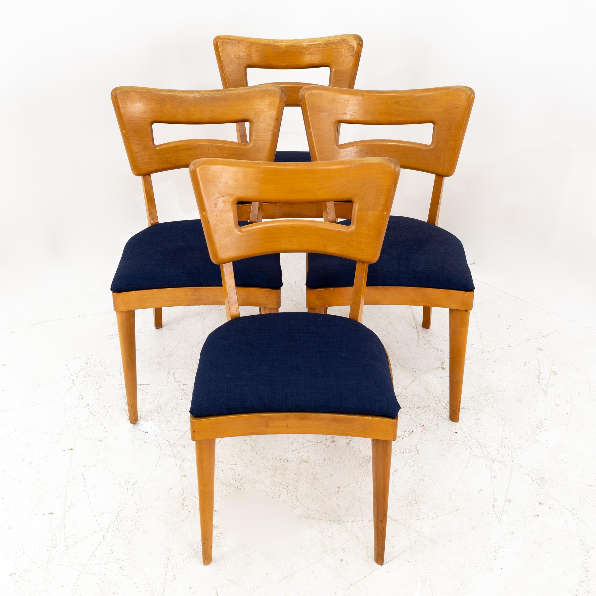 Heywood Wakefield dog bone midcentury solid wood dining chairs, set of four
These chairs are 18 wide and 21 deep by 33 high with an 18.75 inch seat height

All pieces of furniture can be had in what we call restored vintage condition. This means
