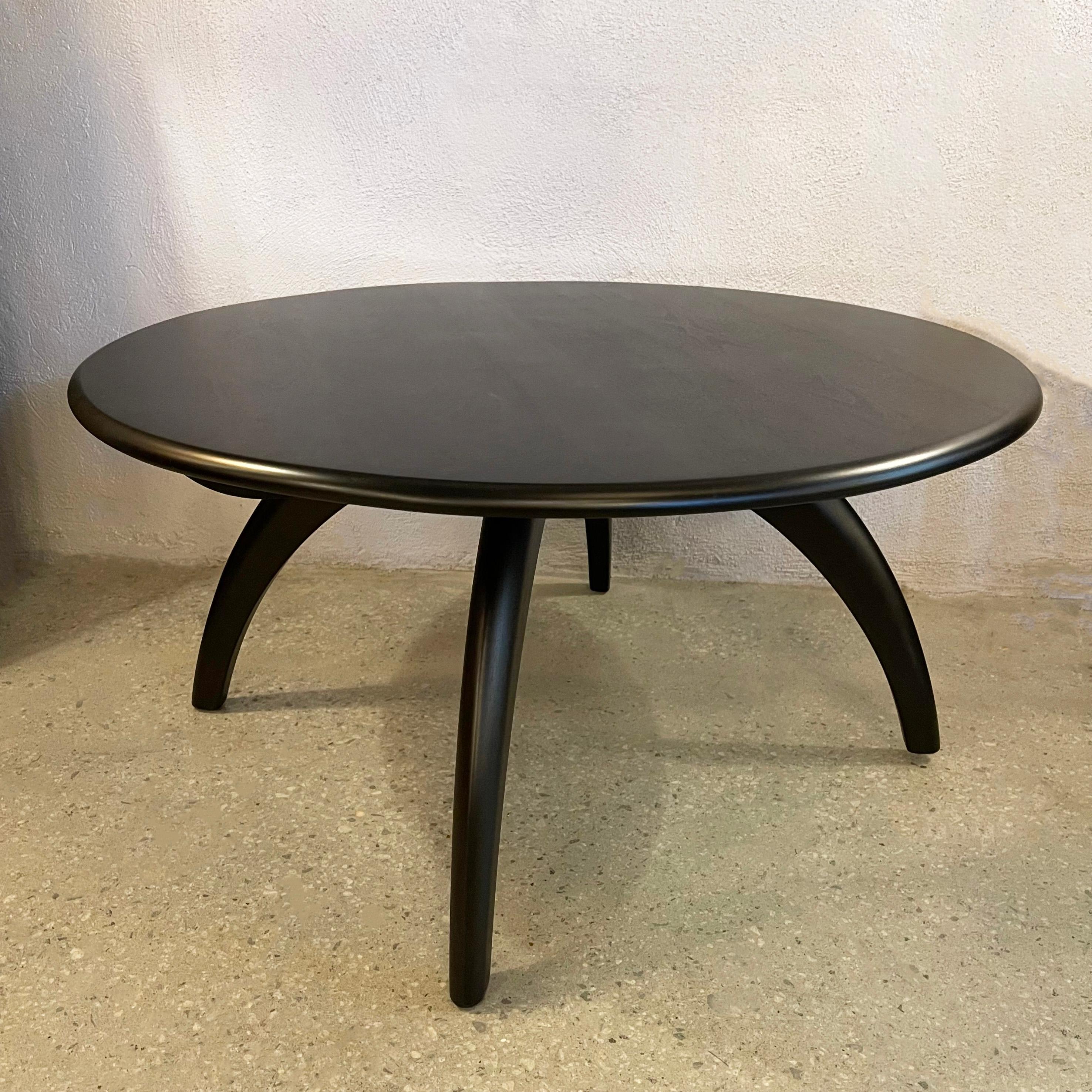 Iconic, Art Deco inspired, Mid-Century Modern, solid ebonized maple, round coffee table by Heywood Wakefield Co. features a 32 inch round 