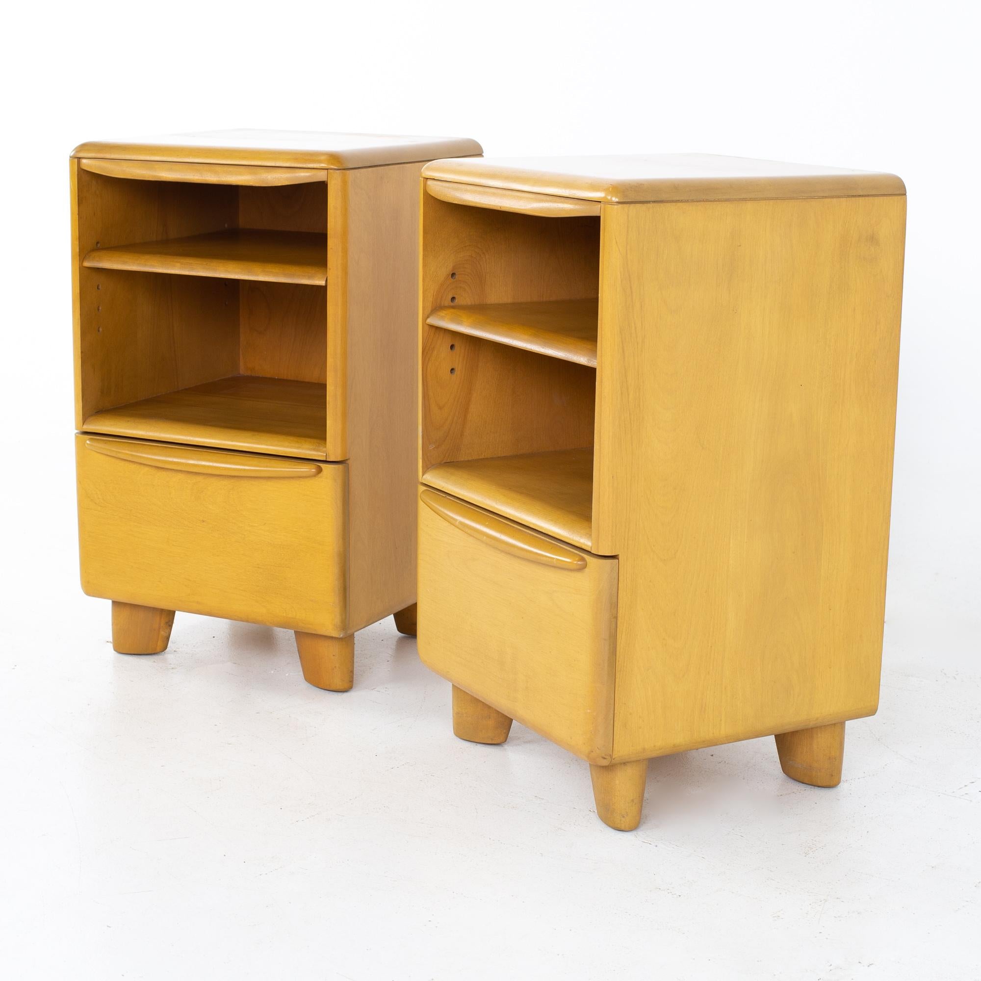 Heywood Wakefield Encore mid century blonde wheat nightstands - A pair
Each nightstand measures: 14.75 wide x 15 deep x 25 inches high

All pieces of furniture can be had in what we call restored vintage condition. That means the piece is