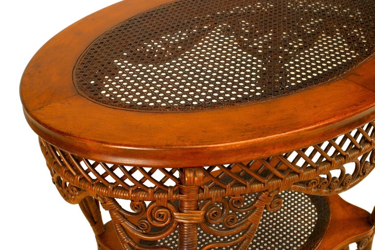 HeywoodWakefield Filigree Wicker Oval Center Table For Sale at 1stdibs