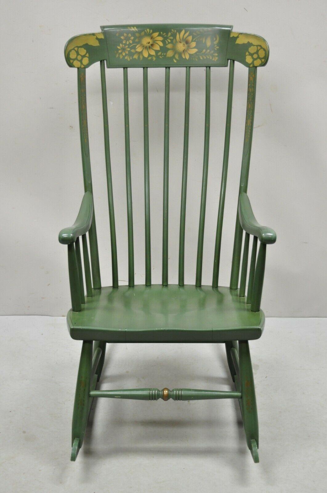 Heywood Wakefield green hitchcock style stencil decorated rocker rocking chair. Item features original green painted finish, stencil paint decorated top rail, original stamps, quality American craftsmanship, great style and form. Circa mid-20th