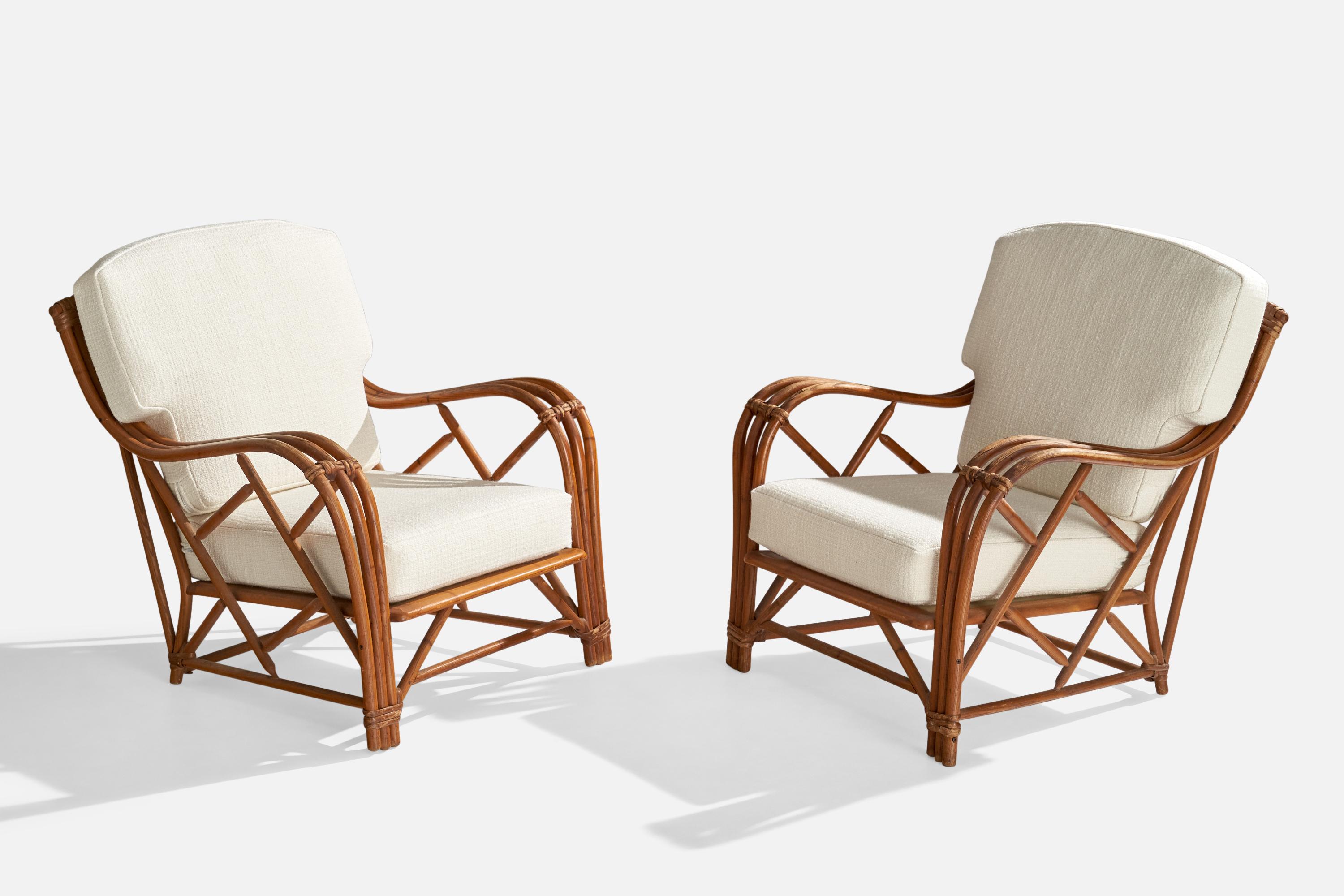 A pair of bamboo, rattan and white fabric lounge chairs produced by Heywood Wakefield, USA, c. 1950s

Seat Height: 15.5