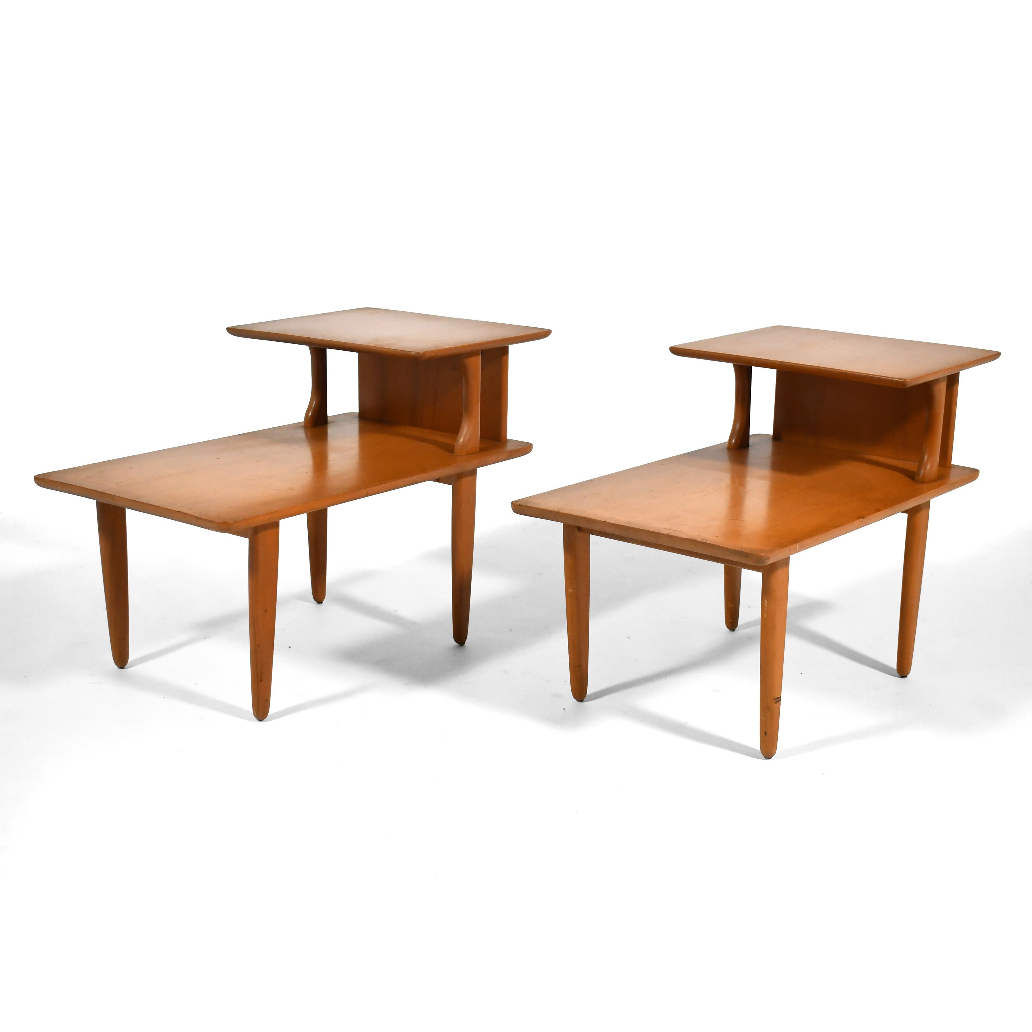 These Heywood Wakefield end tables are a classic mid-century form– the two-tiered 