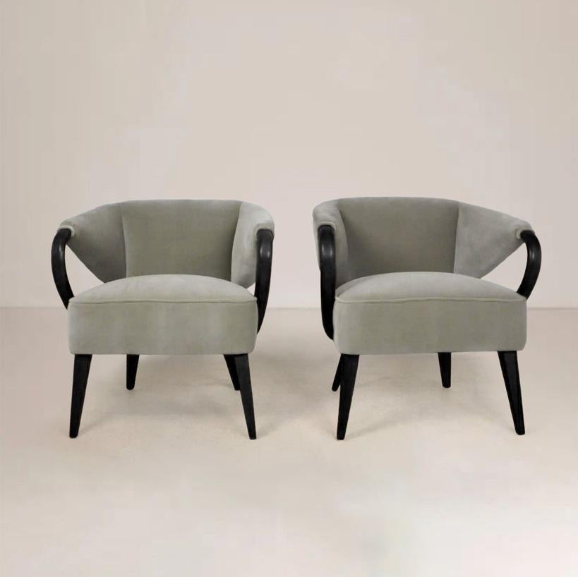 Here is a very nice pair of Open Arm Tub Chair, Ladies' Club Chairs model # M568C by Heywood Wakefield, circa 1951. Manufactured from 1951-58. Our team stripped these chairs down to their frames for a complete restoration. Each freshly upholstered