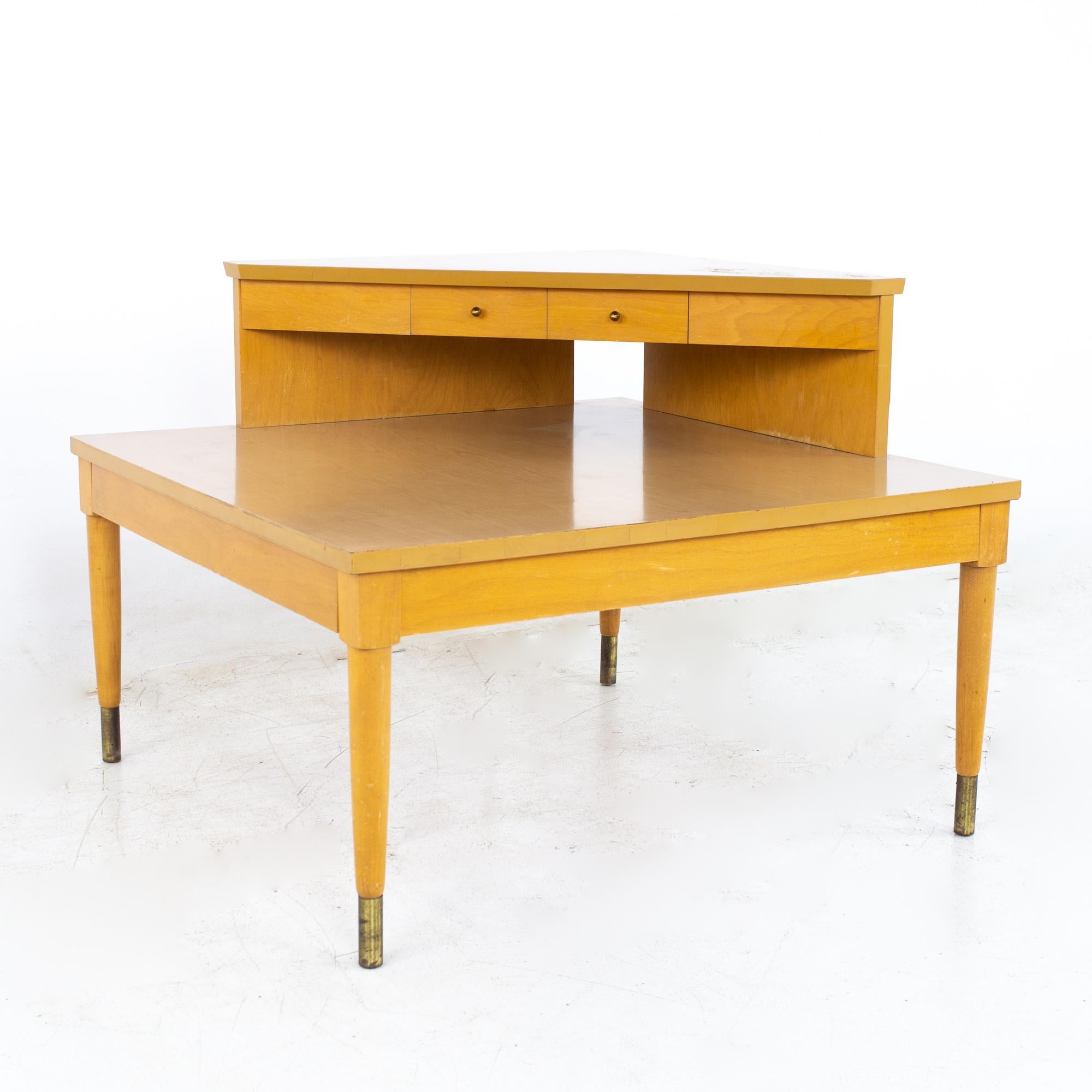 Heywood Wakefield mid century 2 tier corner table with drawers

Table measures: 32 wide x 32 deep x 24.5 inches high

?All pieces of furniture can be had in what we call restored vintage condition. That means the piece is restored upon purchase