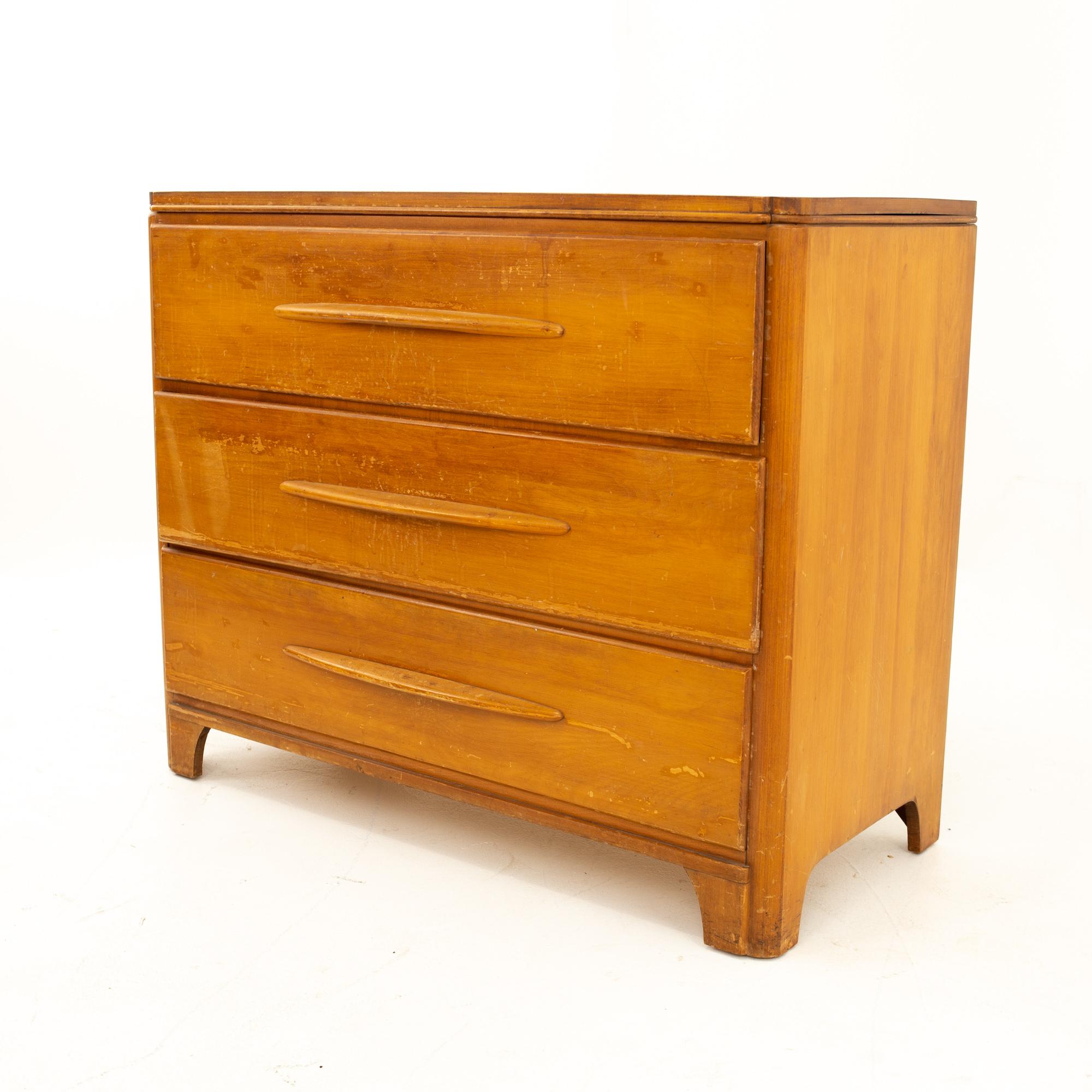 Heywood-Wakefield mid century 3 drawer chest
Chest measures: 42 wide x 19 deep x 34.5 high

All pieces of furniture can be had in what we call restored vintage condition. That means the piece is restored upon purchase so it’s free of watermarks,