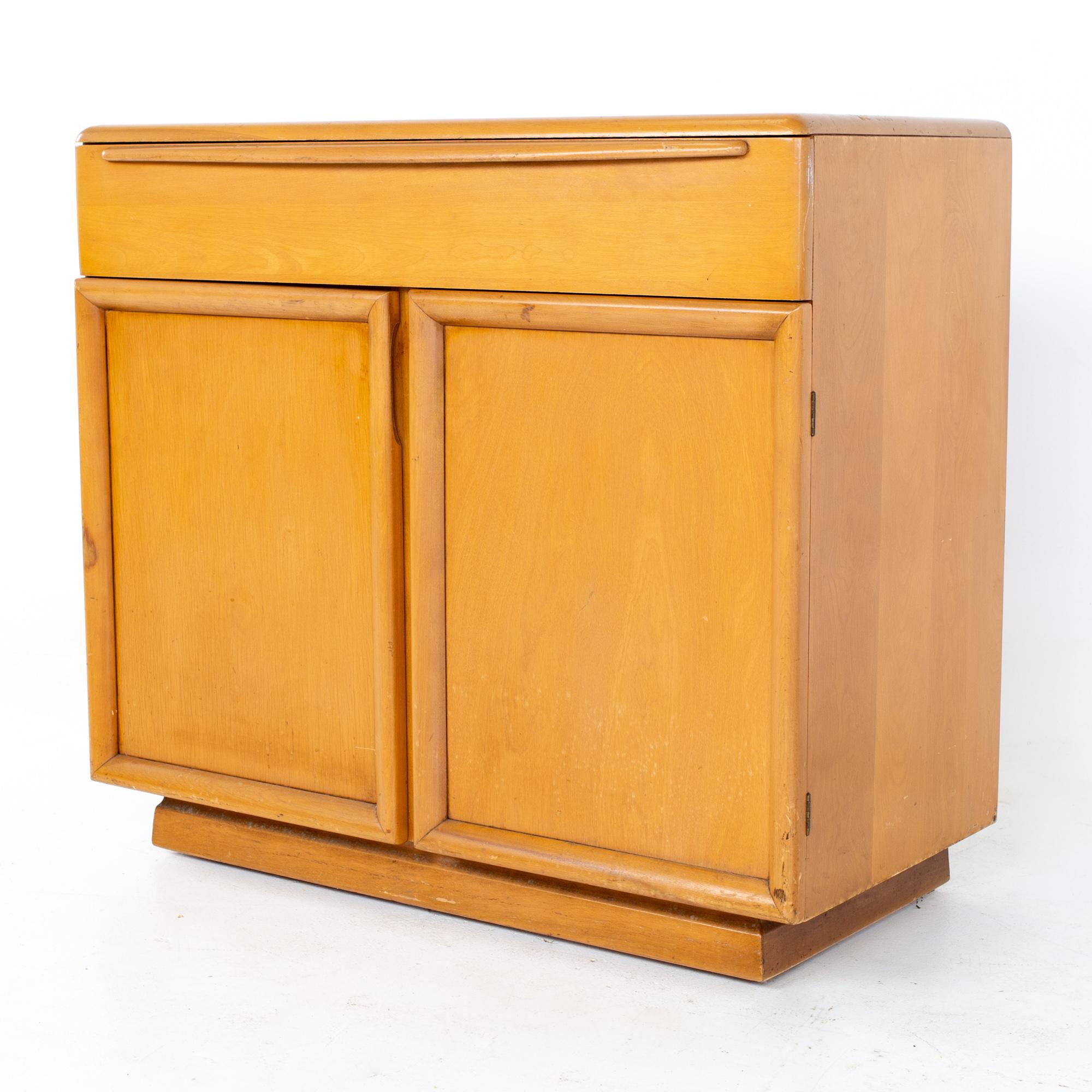 Heywood Wakefield mid century bar record sideboard buffet credenza
Credenza measures: 35.5 wide x 18 deep x 32 inches high

All pieces of furniture can be had in what we call restored vintage condition. That means the piece is restored upon