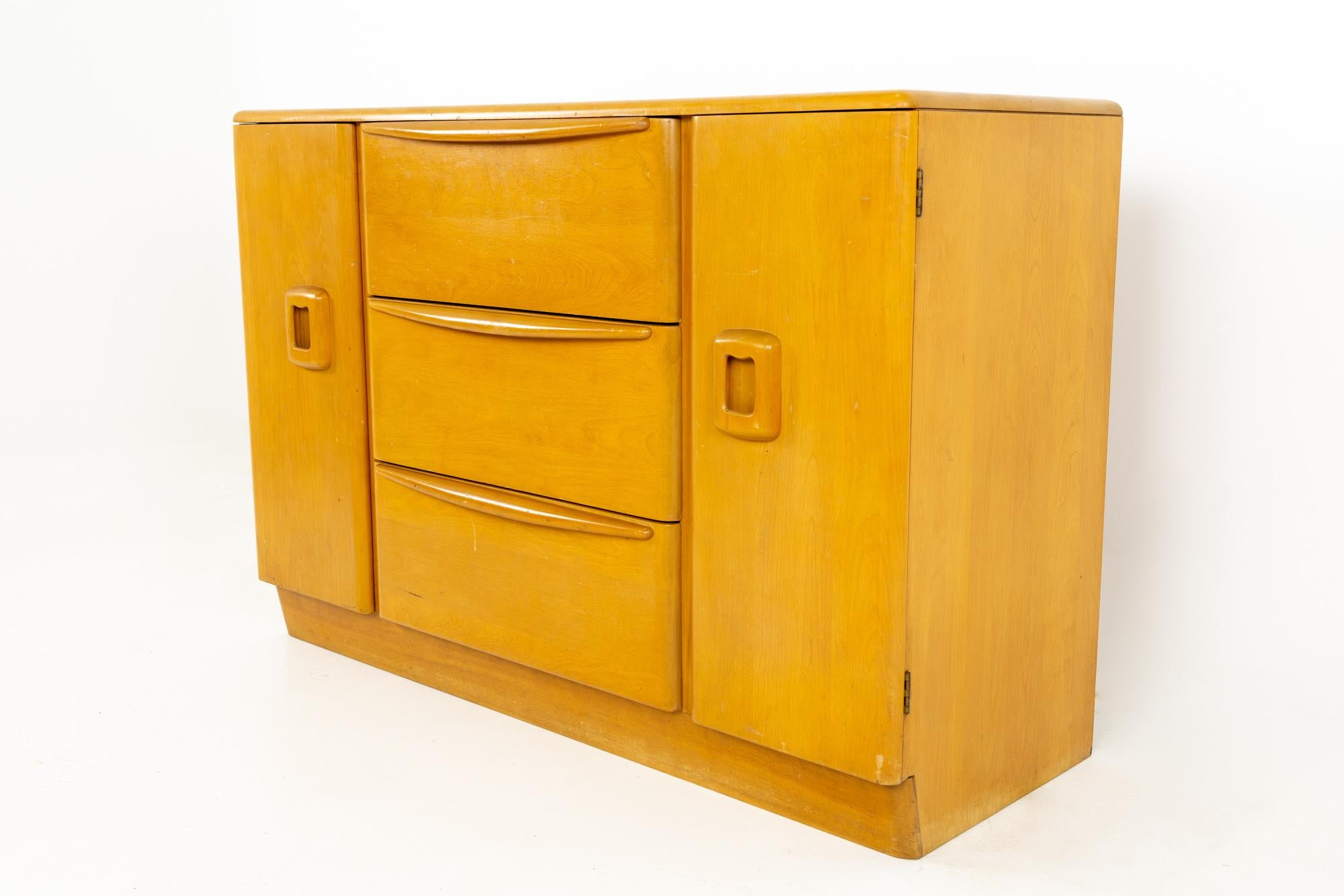 Heywood Wakefield mid century blonde solid wood sideboard buffet credenza
This piece measures 48 wide x 18.75 deep x 32.5 inches high

All pieces of furniture can be had in what we call restored vintage condition. That means the piece is restored