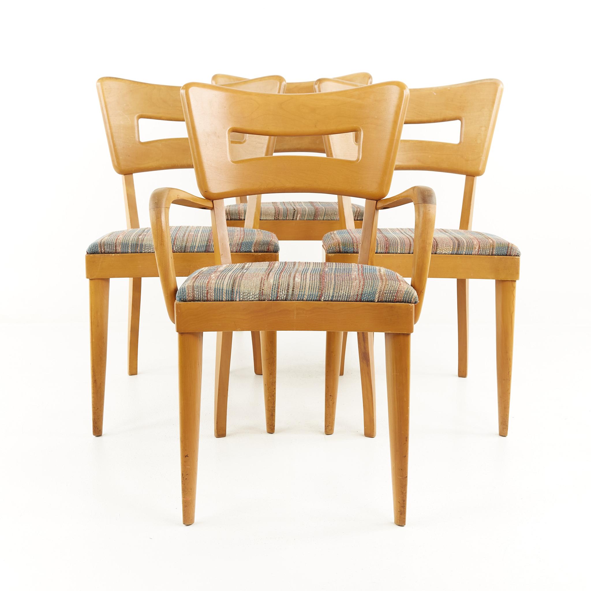 Heywood Wakefield Mid century dog bone dining chairs - set of 4

Each chair measures: 22 wide x 16 deep x 33 high, with a seat height of 17.5 inches and arm height/chair clearance of 25 inches

All pieces of furniture can be had in what we call
