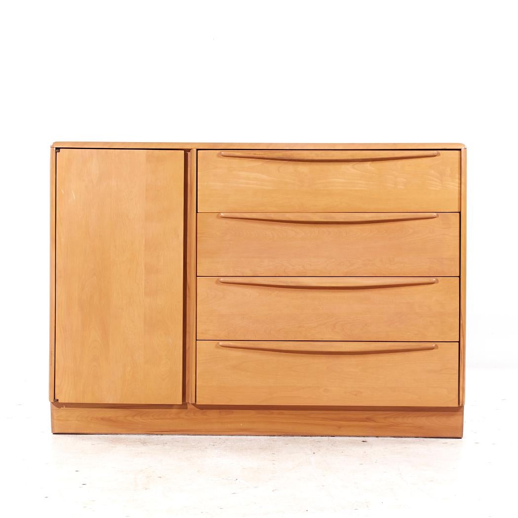 Heywood Wakefield Mid Century Maple 4 Drawer Vanity Dresser

This dresser measures: 48 wide x 18 deep x 34.25 inches high

All pieces of furniture can be had in what we call restored vintage condition. That means the piece is restored upon purchase
