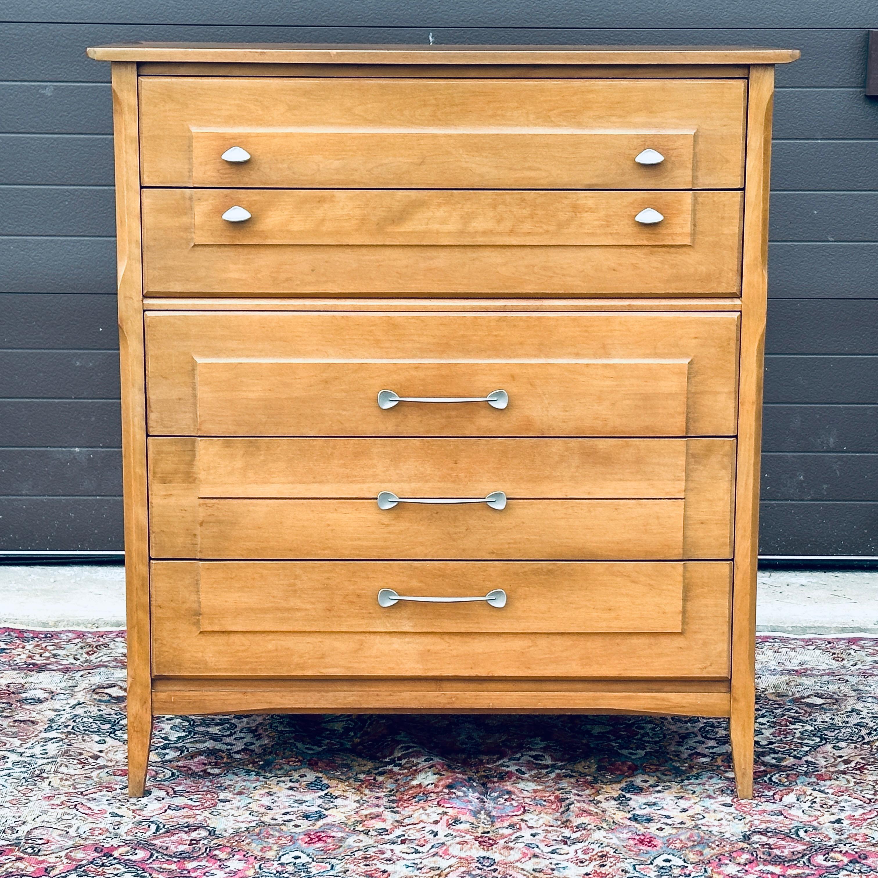 Vintage Heywood Wakefield model M1962 tall chest in original Topaz finish featuring solid birch construction and five dovetailed drawers with modernist hardware. Circa 1960.