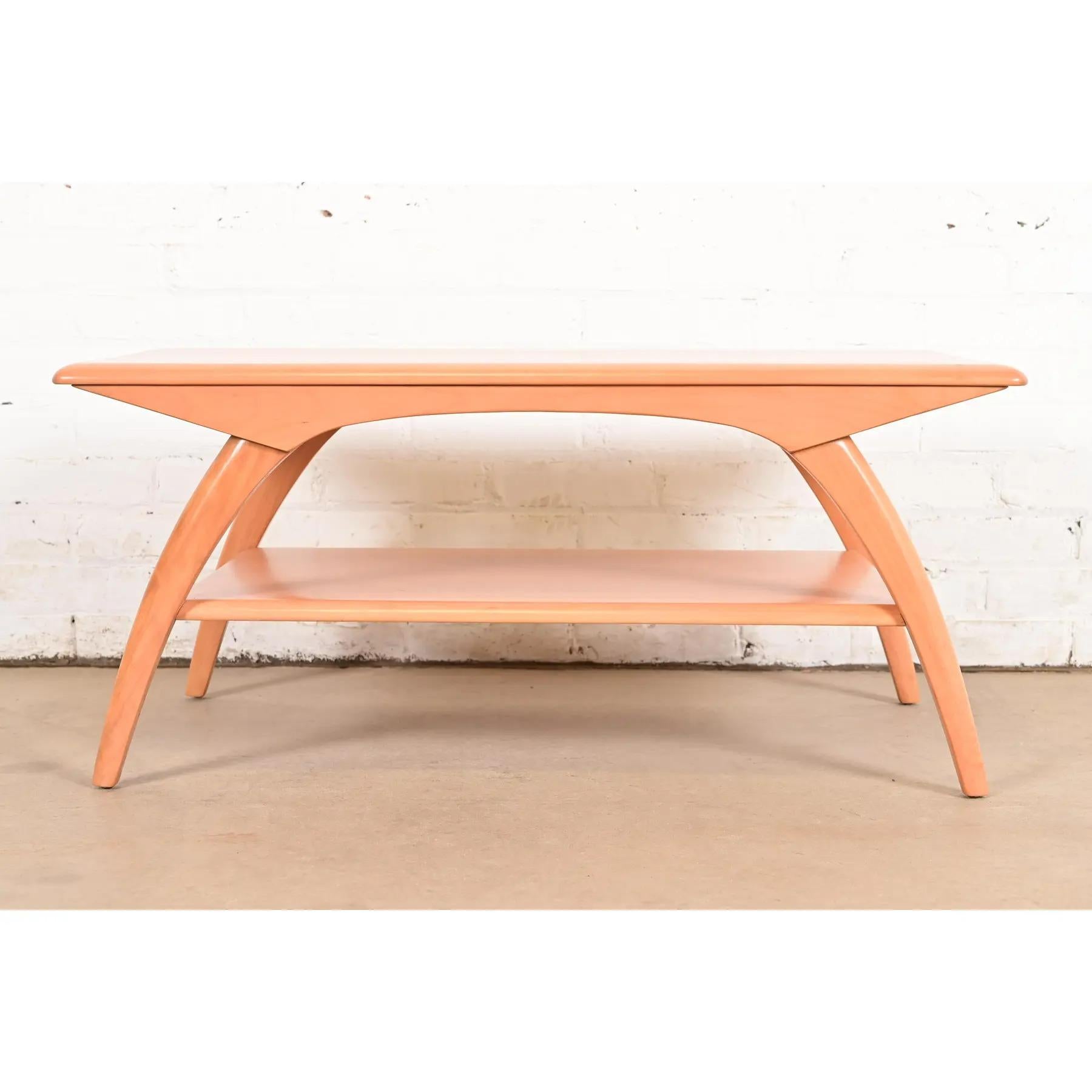 A gorgeous Mid-Century Modern coffee table or cocktail table

By Heywood Wakefield

USA, 1950s

Sculpted solid maple, with spider legs.

Measures: 36.25