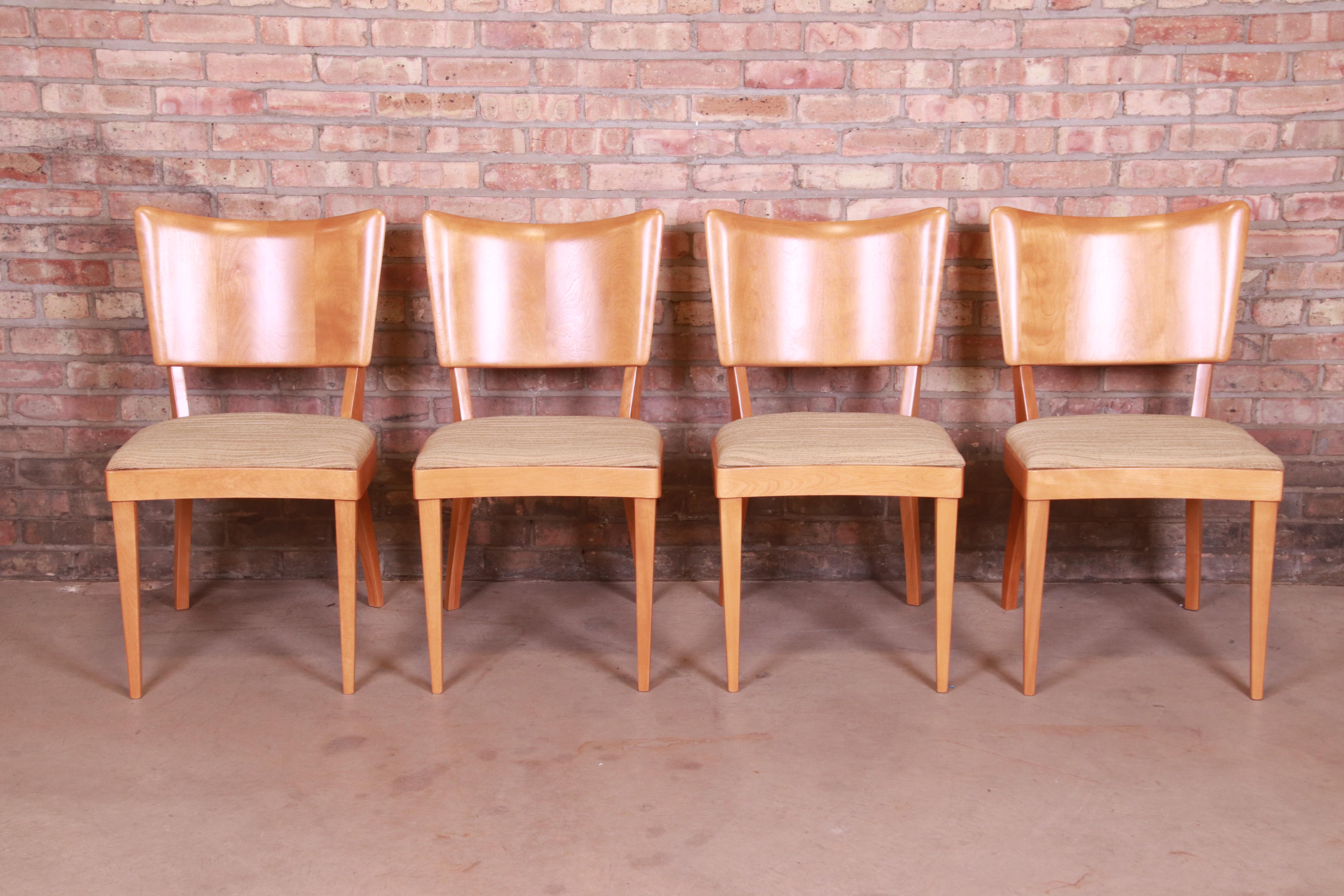 A gorgeous set of four Mid-Century Modern stingray dining chairs

By Heywood Wakefield

USA, 1950s

Solid maple, with upholstered seats.

Measures: 18.75