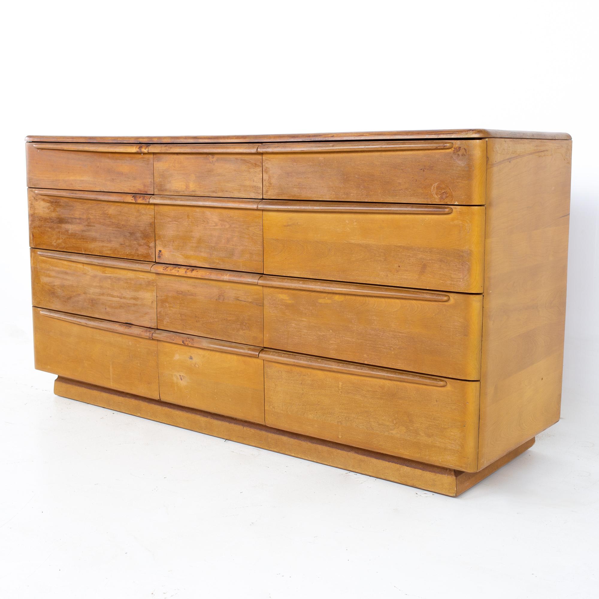 Heywood Wakefield Mid Century solid wood 12 drawer lowboy dresser
Dresser measures: 62 wide x 20 deep x 32.75 inches high

All pieces of furniture can be had in what we call restored vintage condition. That means the piece is restored upon