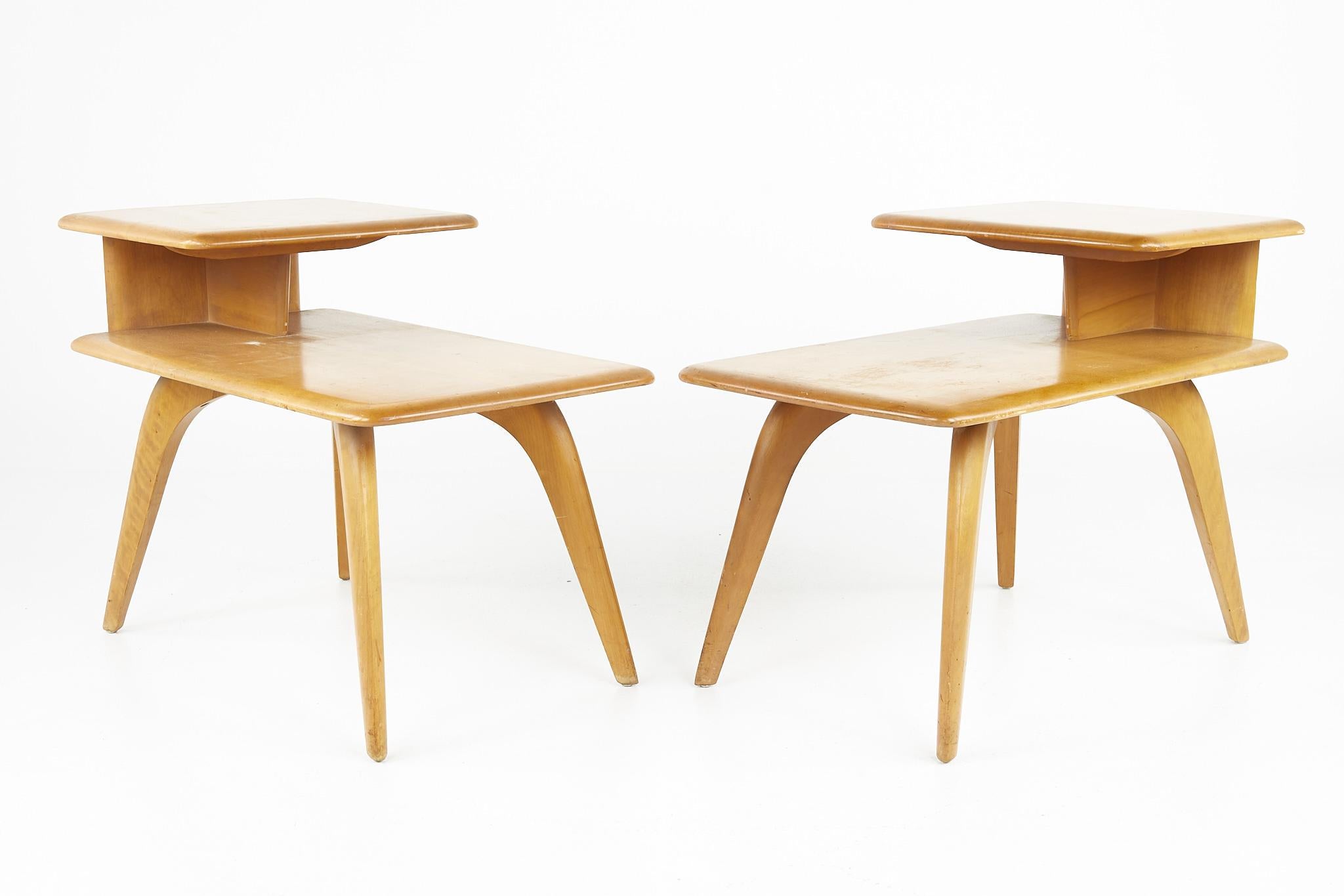 Heywood Wakefield mid century step side end tables - a pair

Each table measures: 29.5 wide x 17 deep x 22 inches high

?All pieces of furniture can be had in what we call restored vintage condition. That means the piece is restored upon