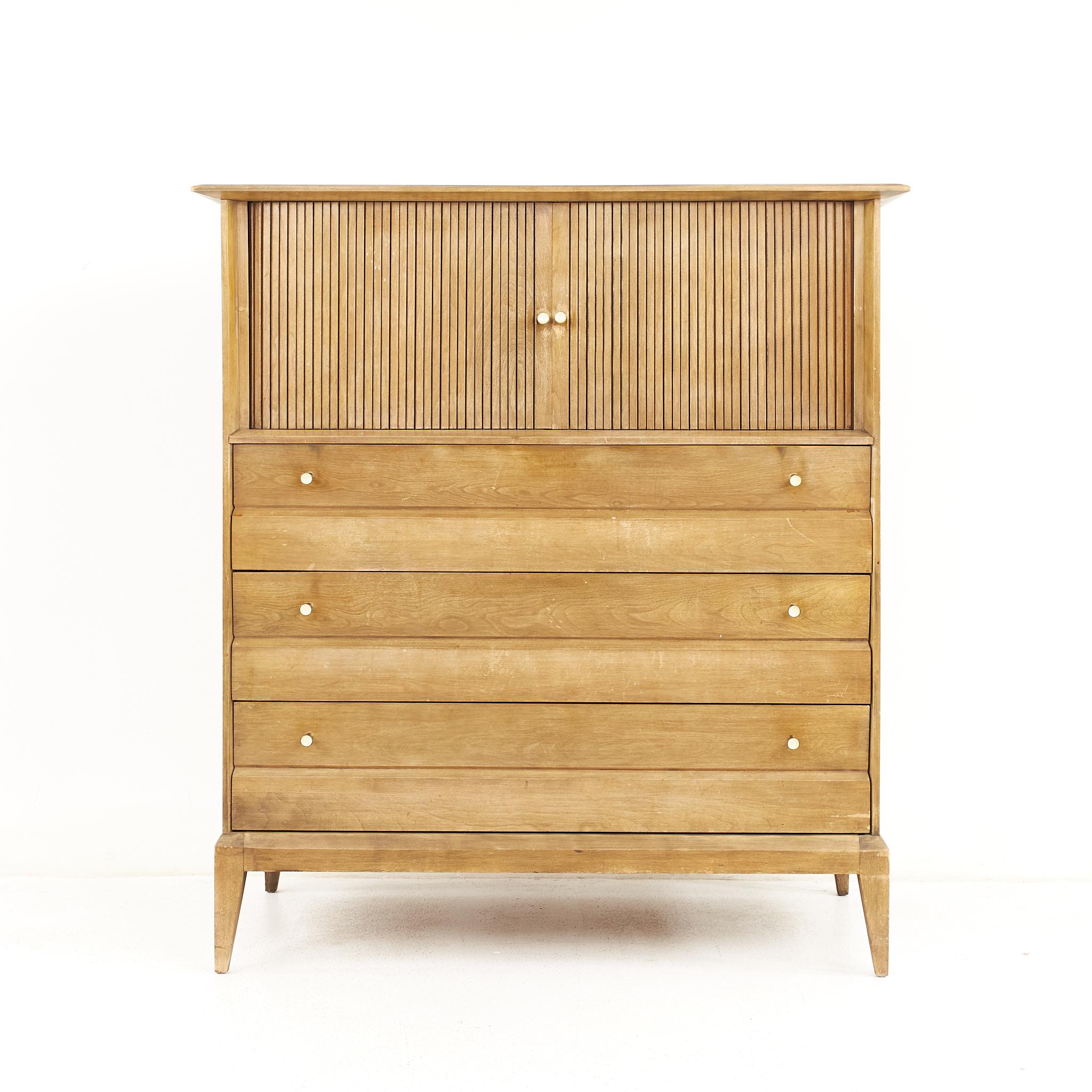 Heywood Wakefield mid century tambour door highboy dresser

The dresser measures: 41 wide x 20.5 deep x 45.5 inches high

All pieces of furniture can be had in what we call restored vintage condition. That means the piece is restored upon