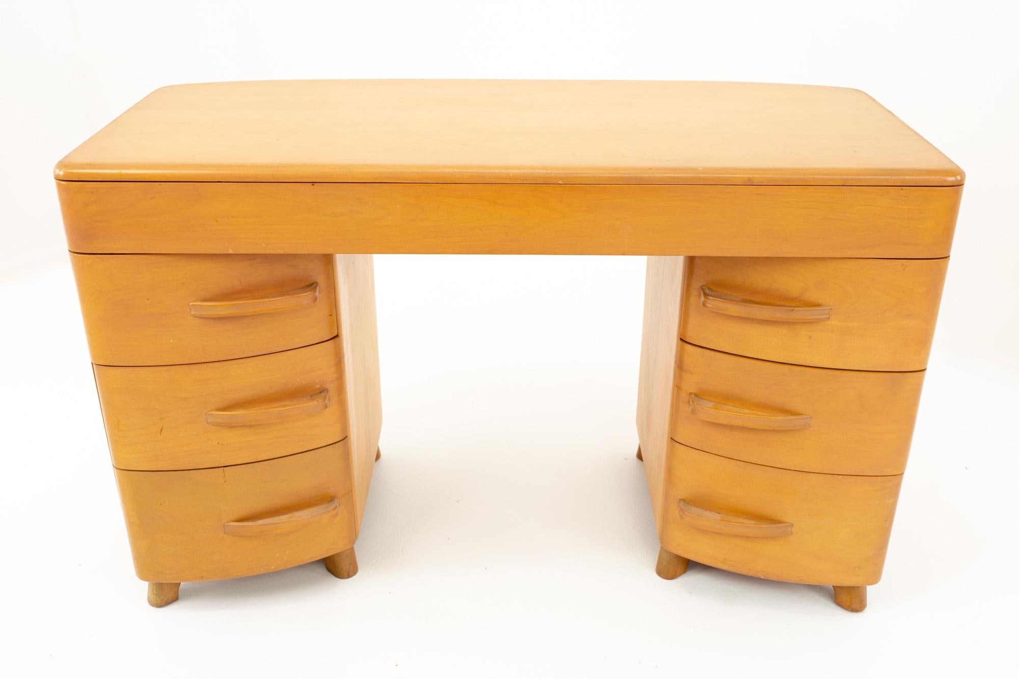 Heywood Wakefield mid century vanity or desk

Desk measures: 49.75 wide x 24 deep x 29.25 high

?All pieces of furniture can be had in what we call restored vintage condition. That means the piece is restored upon purchase so it’s free of