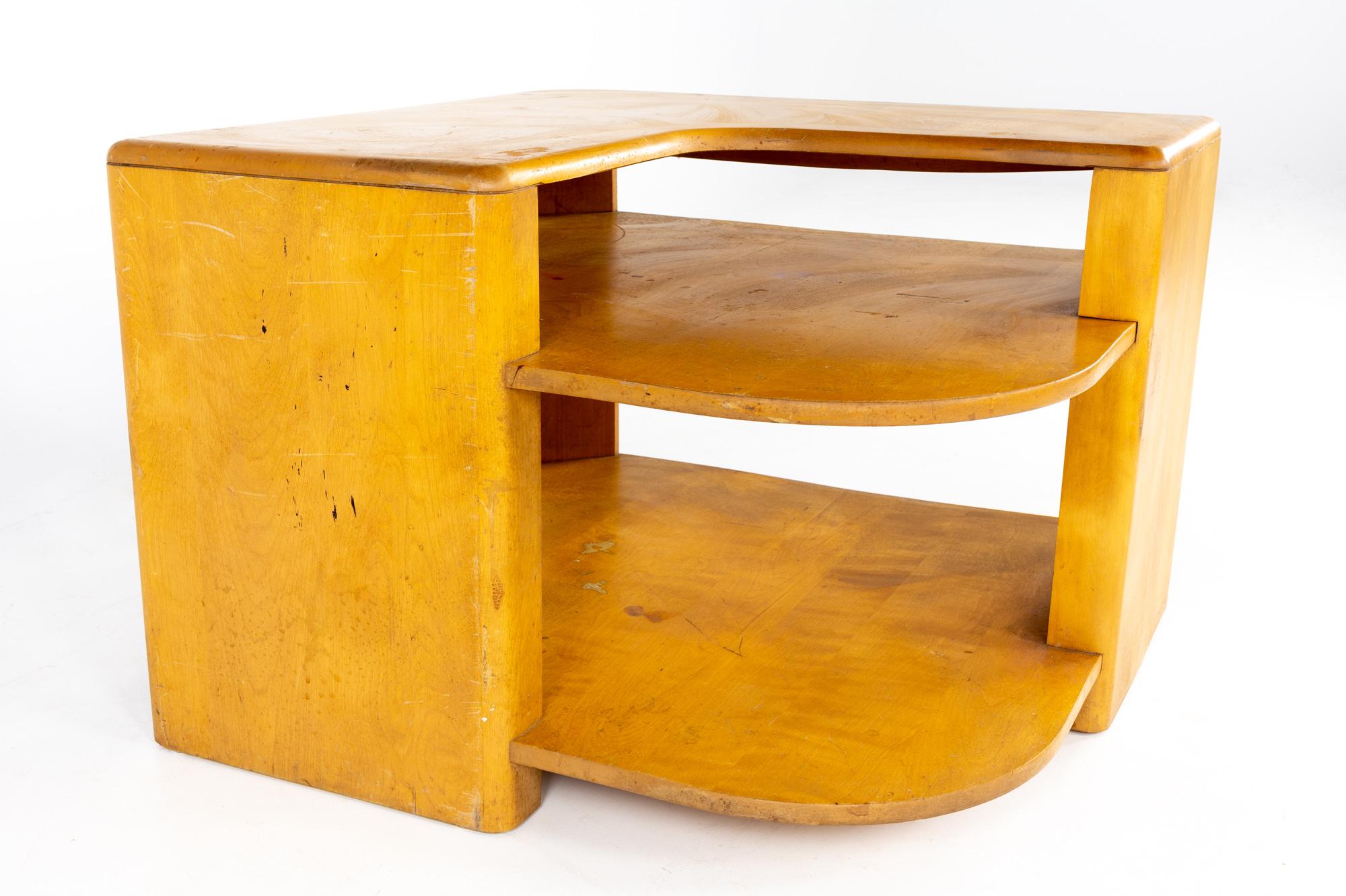 Heywood Wakefield mid century wheat 3 tier corner table.

This table measures: 32 wide x 32 deep x 22.5 inches high.

All pieces of furniture can be had in what we call restored vintage condition. That means the piece is restored upon purchase