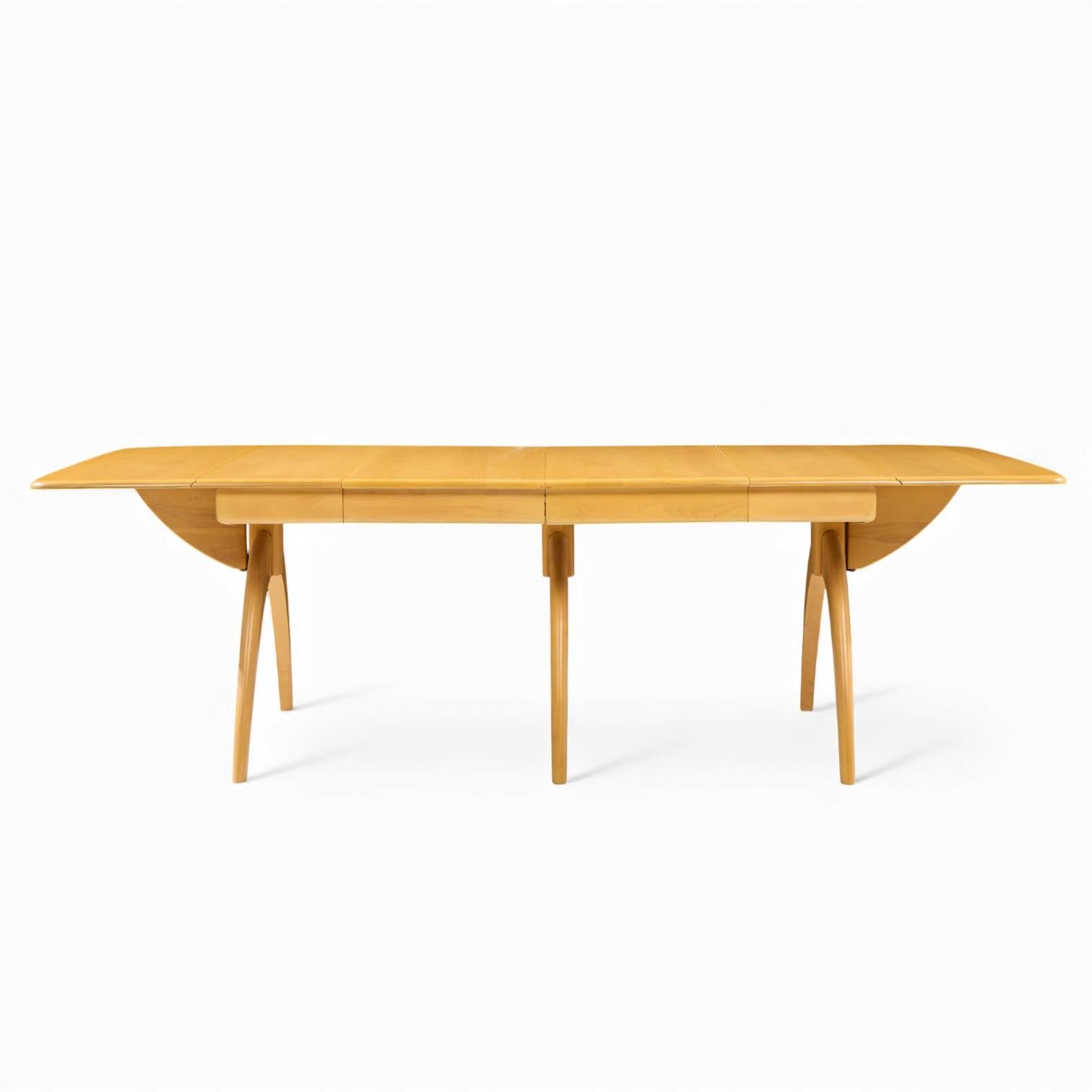 Heywood Wakefield Mid Century Wheat Wishbone Dining Table avec 2 Leaves

Cette table mesure : 26 pouces de largeur x 40 pouces de profondeur x 28,75 pouces de hauteur, avec un dégagement pour les chaises de 24,5 pouces ; chaque feuille rabattable a