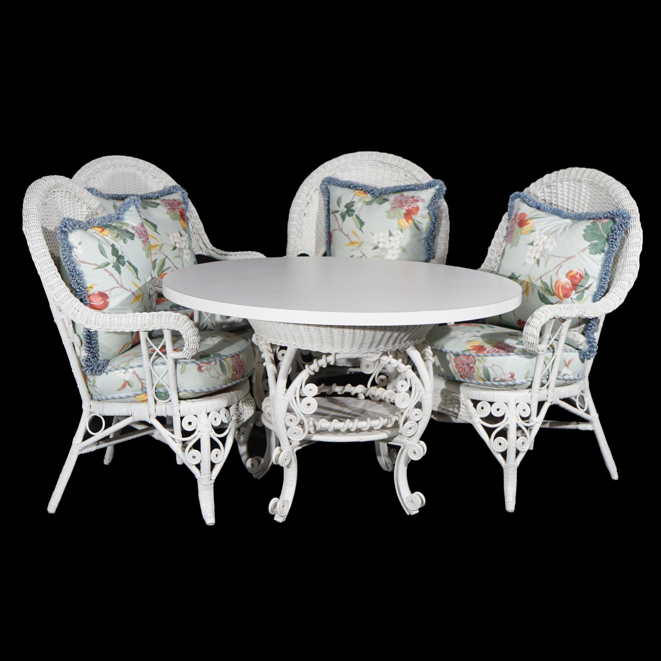 ***Ask About Reduced In-House Shipping Rates - Reliable Service & Fully Insured***
Heywood Wakefield School Scrolled White Wicker Five-Piece Dining Set 20thC

Measures- Chairs: 44.5''H x 28.5''W x 27''D; 16'' SH without cushion, 21'' SH with