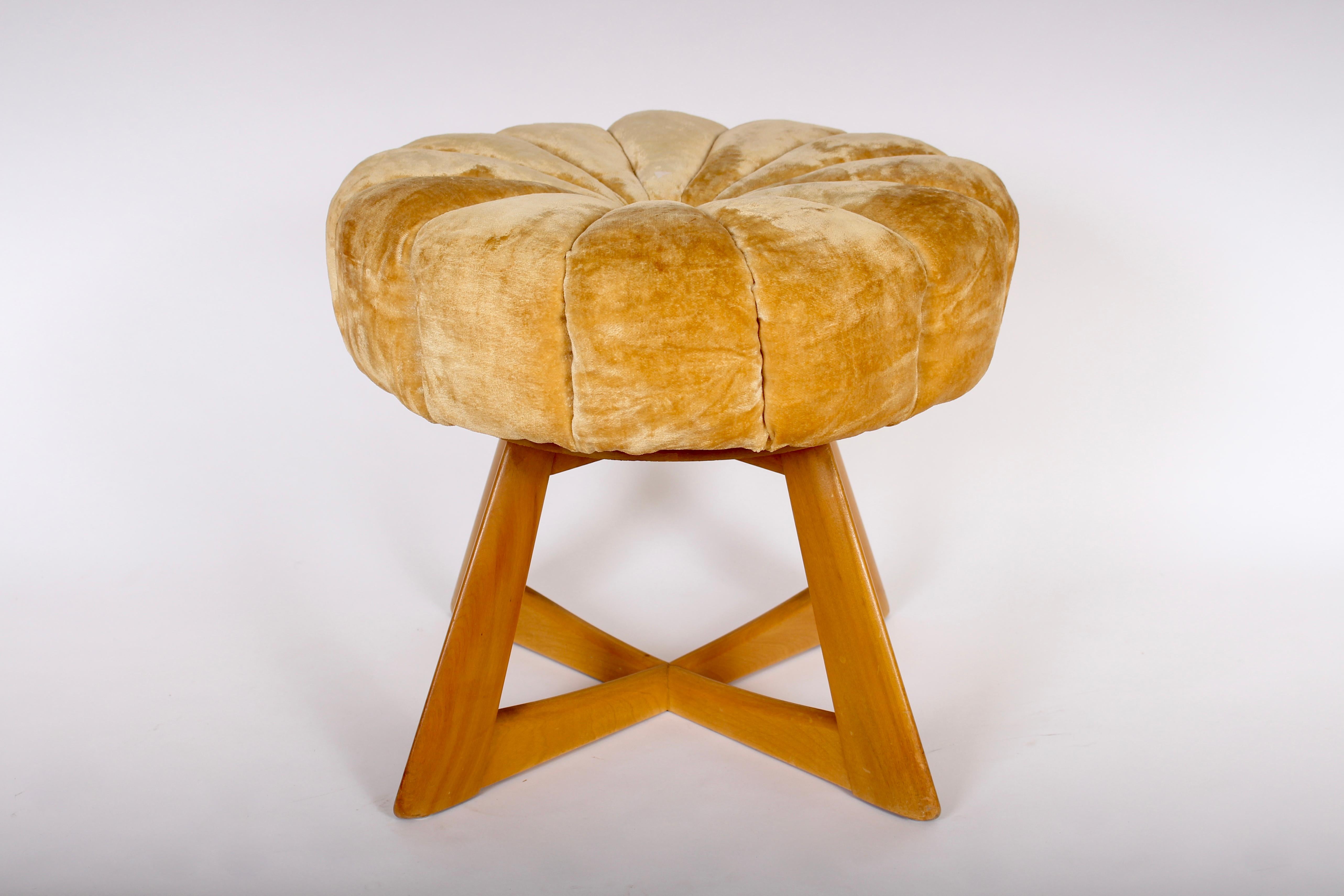 Heywood Wakefield sculptura swivel ottoman pouf vanity stool in maple. Cross leg base. With tufted and scalloped crushed velvet seat in mustard yellow. Wheat finish. Sturdy. Solid. Rarity. Stamped with makers mark to underside.