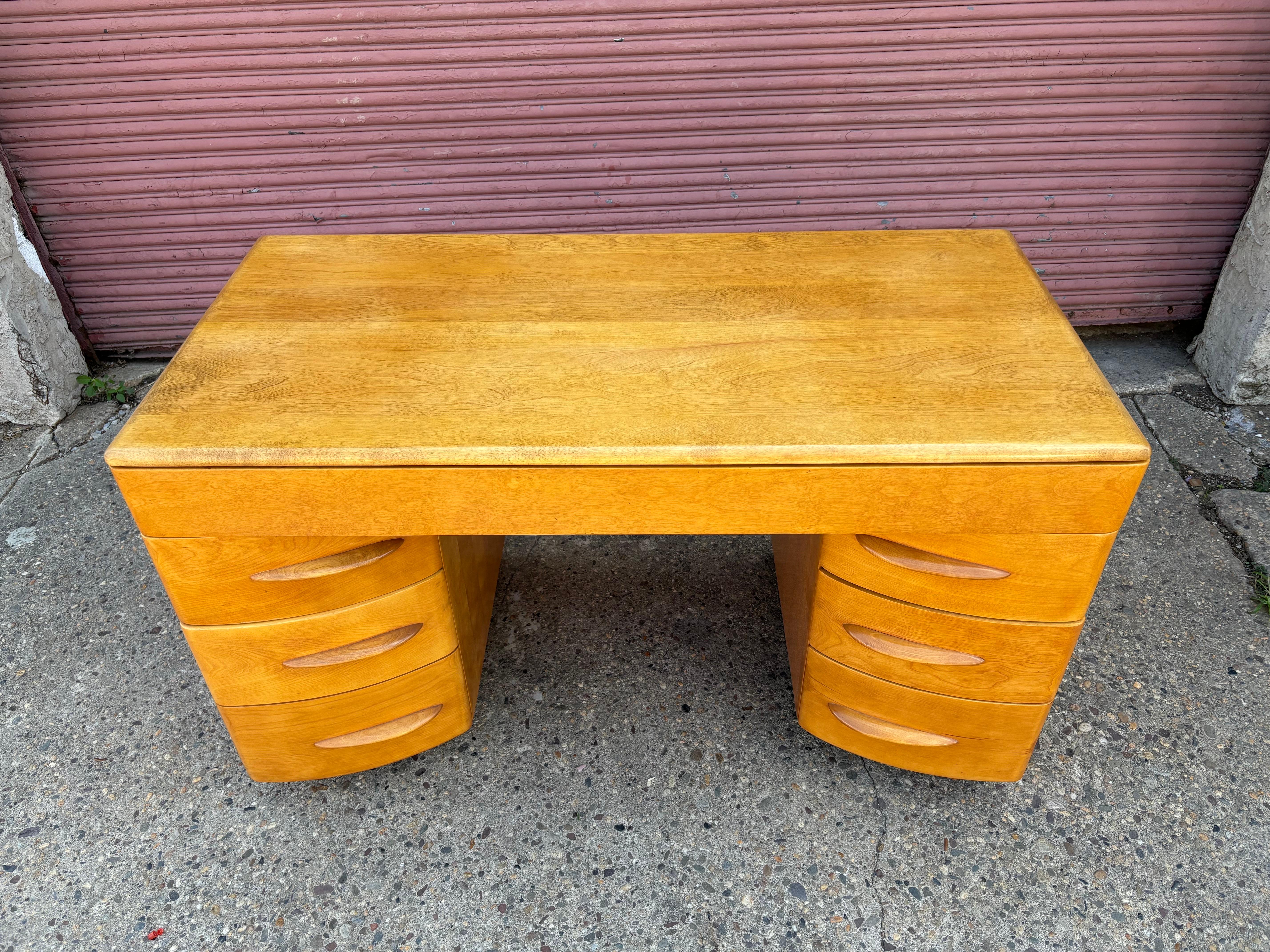 Heywood Wakefield Solid Maple Curved Front Desk.  One of my favorite Wakefield Designs!  Practical and well Built!  This is a workhorse desk that gets the job done well adding great design to a room!  One of the few American Made Solid Wood