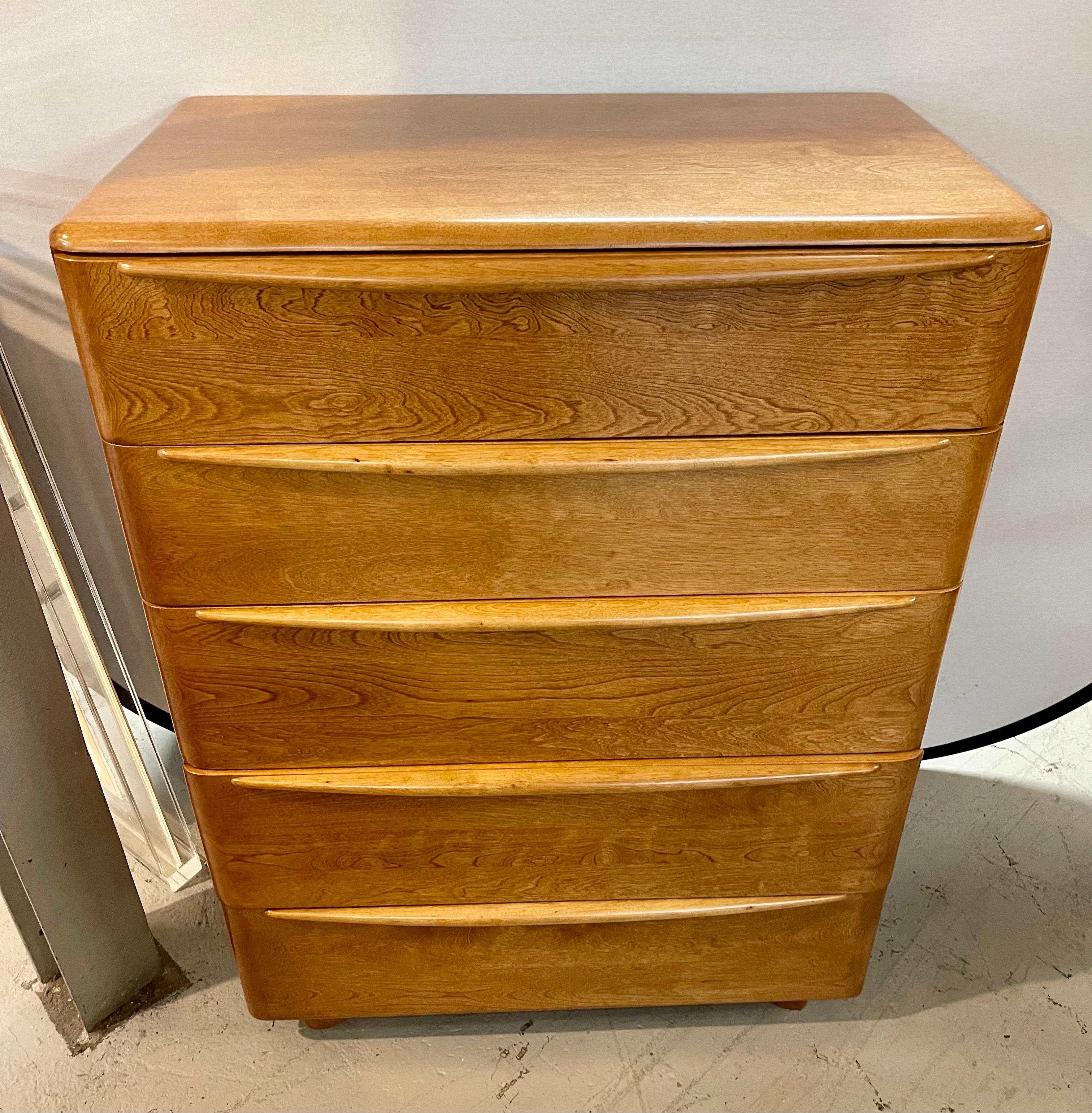 Tall Heywood Wakefield chest with birch construction with case having five long drawers. Wheat finish. Iconic classic mid century classic. Own the best.
