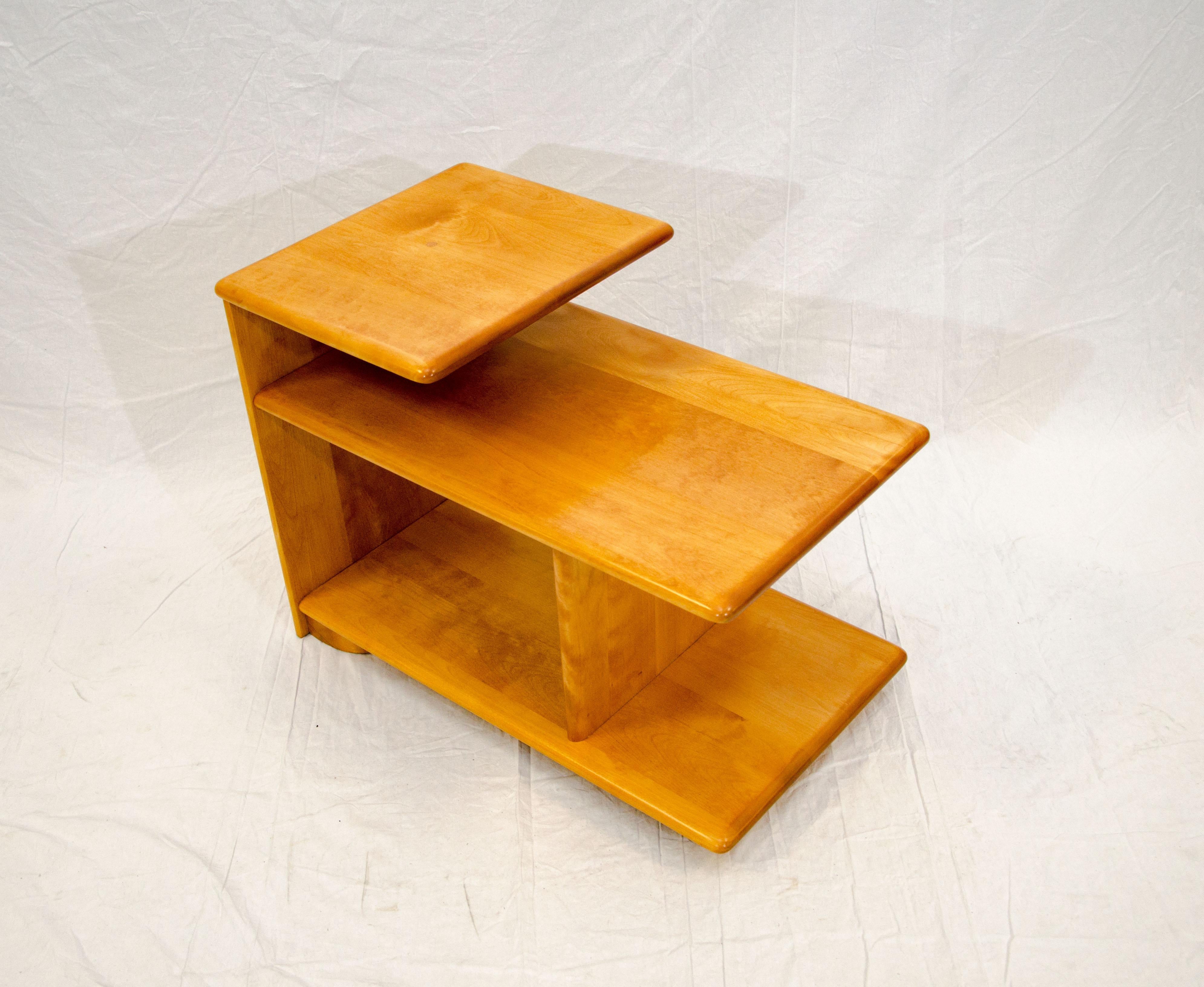 Early 1940s Art Deco style three-tier end table with a half size top tier. There is 13