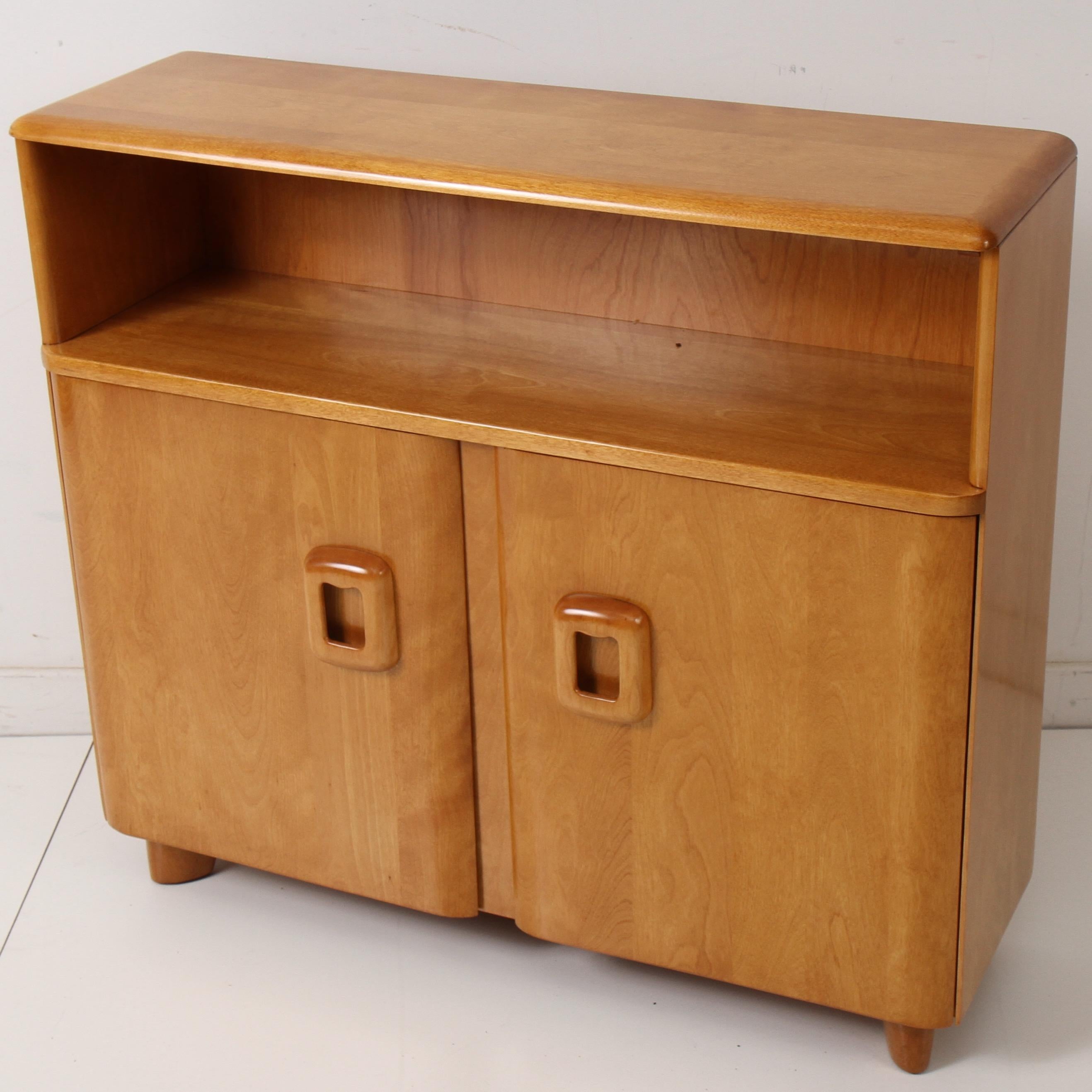 Vintage Heywood Wakefield piece refinished in a clear coat rather than the original, slightly milky, 