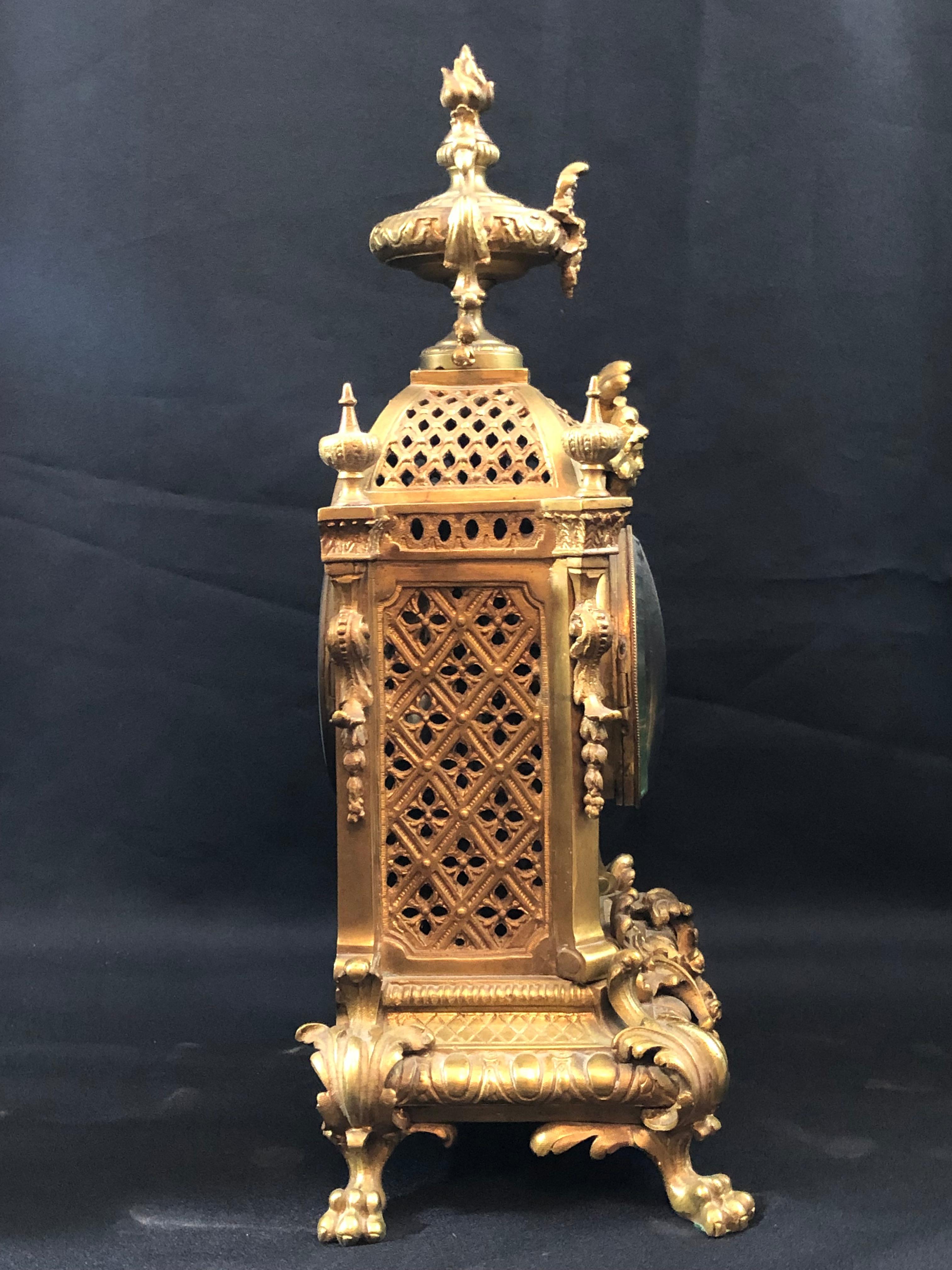H&F Paris three-piece clock set, bronze, 19th century, candelabra, French 

Running, Chimes on hour and half hour.

Clock is 17