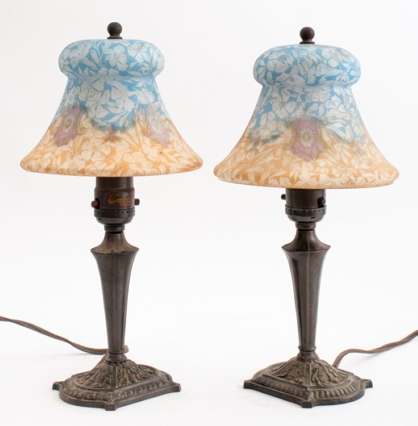 Pair of H.G. McFaddin and Company Emeralite Bellova Art Glass Desk Lamps, with etched floral exterior and blue and orange with floral motifs interior, marked to interior of lampshades 12.5