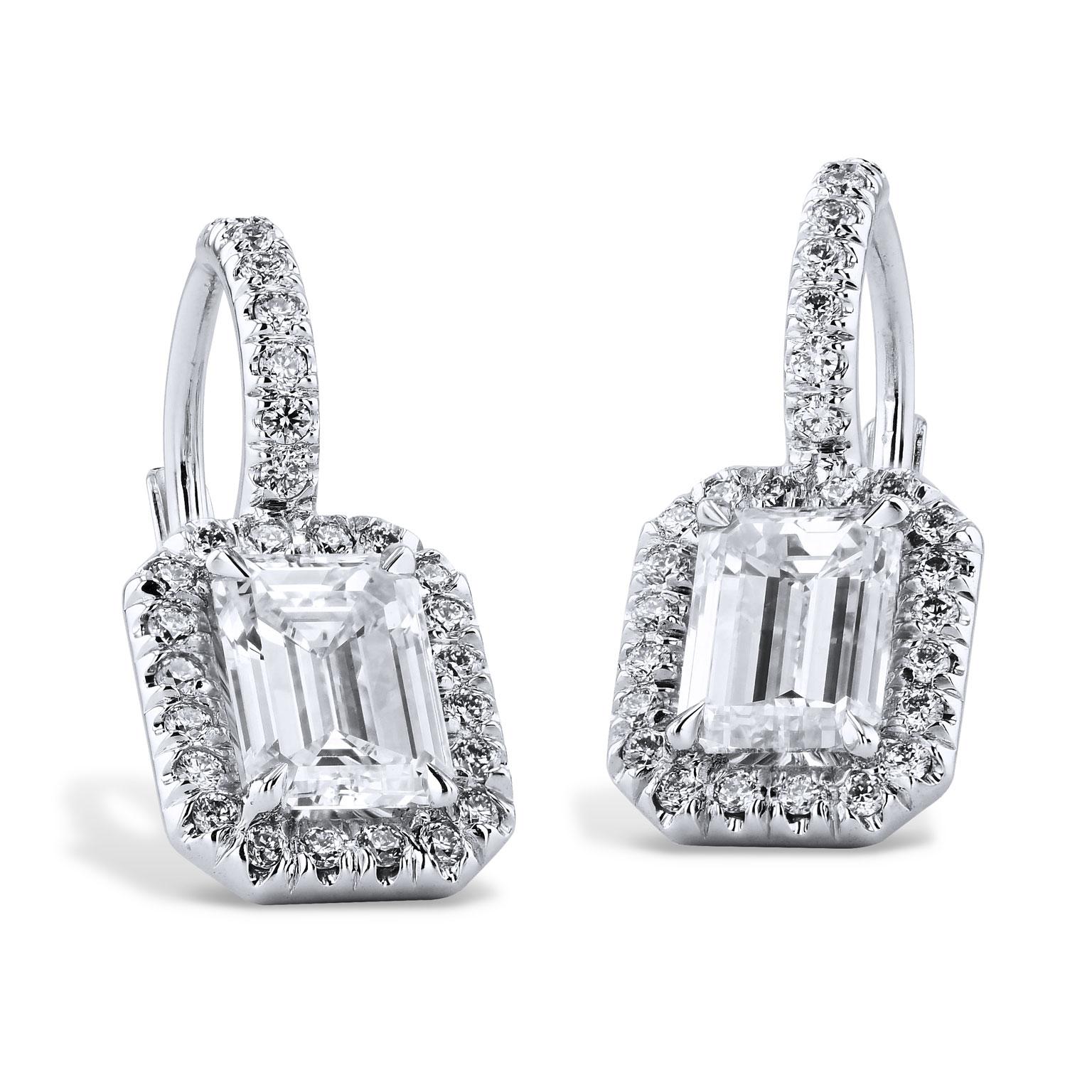GIA Certified 1.81 carat total weight Emerald Cut Diamond White Gold Earrings 

These eye-catching diamond earrings are one of a kind and handmade by H&H Jewels.  They have a total weight of 1.81 carats in Emerald cut diamonds.  Both of the center