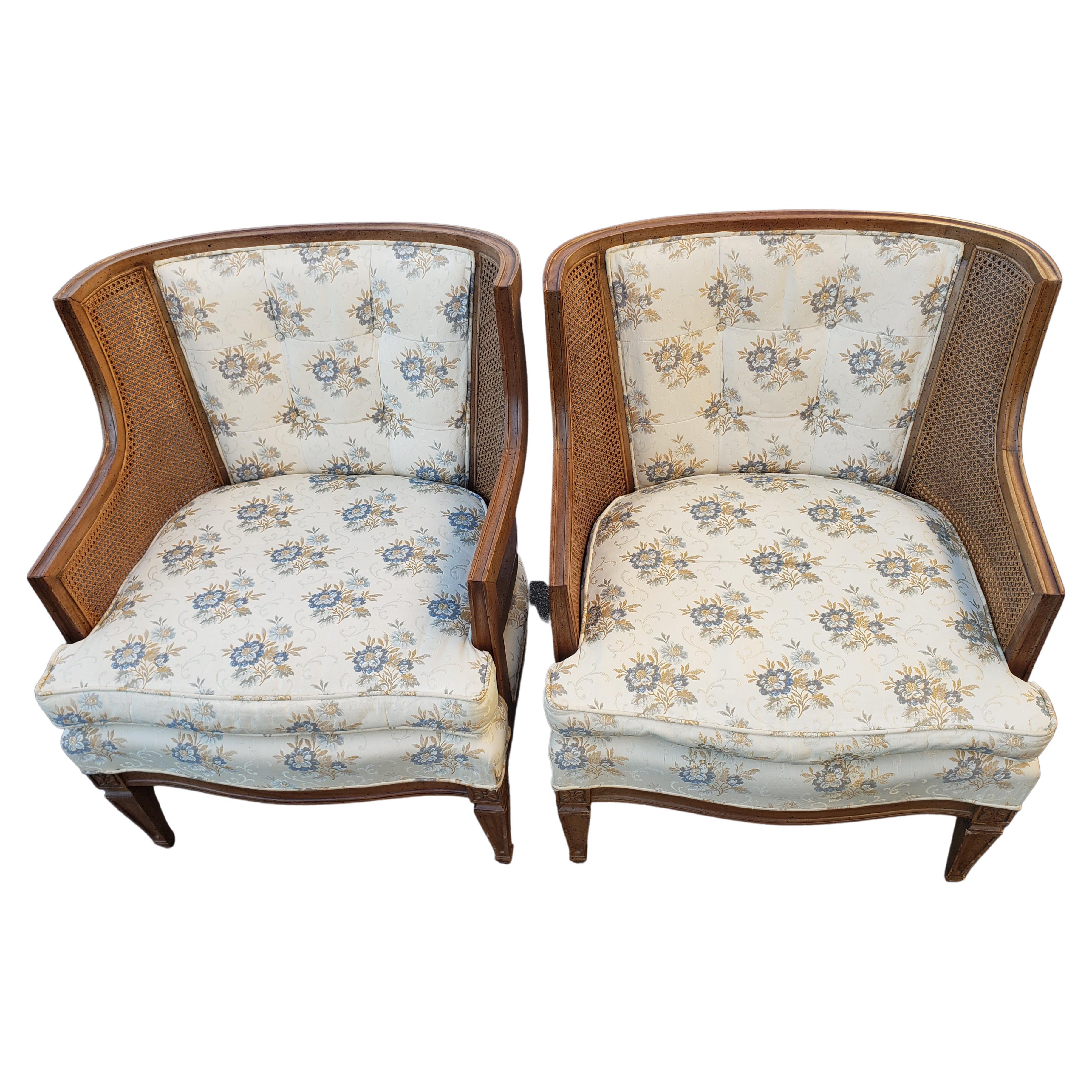 Hibriten French Bergere walnut cane upholstered chairs. Good vintage condition. Enjoy the comfort of classic French Bergere seating by Hibriten. Very comfortable seating with a mixture of natural hair seat (horse mane and hog hair) and other poly