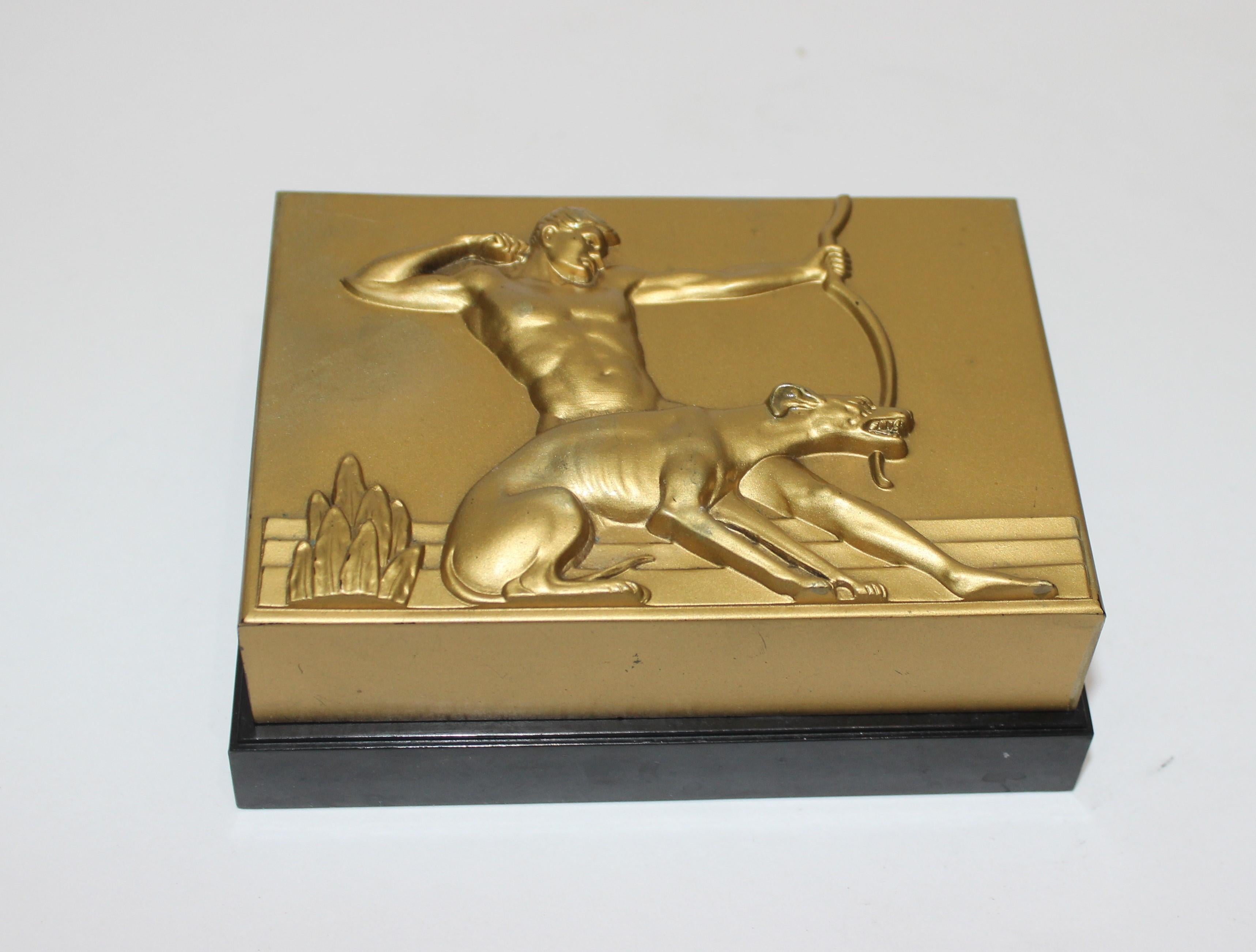 Rare rectangular Hickok Art Deco trinket box archer and hunting hound Motif 1930s from a Palm Beach estate. Also unusual is the slight lip of base visible when closed.

Signature logo inside both top and bottom; 