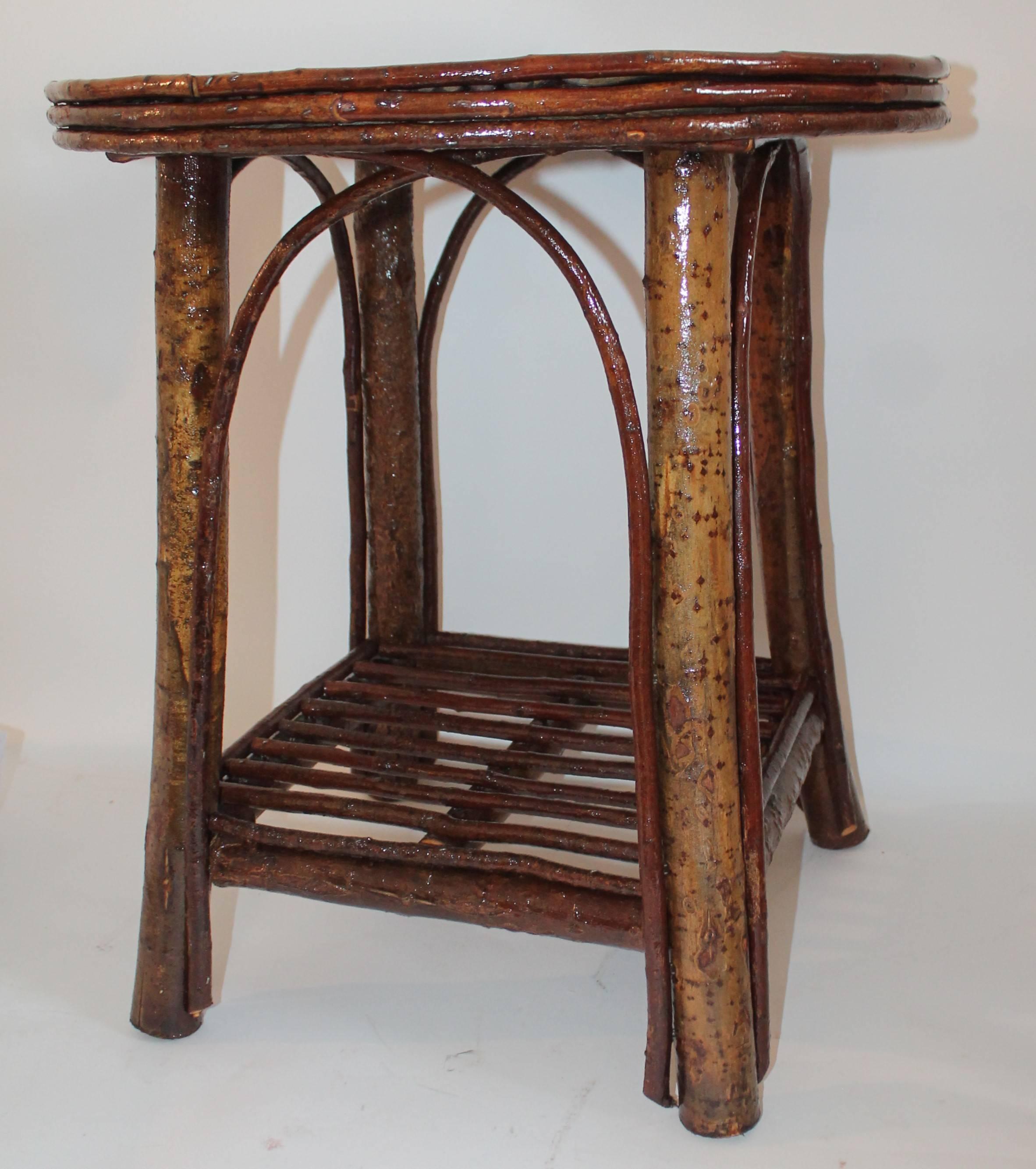 Adirondack hickory rustic twig side table. This cool little birch bark covered twig table is in good sturdy condition.