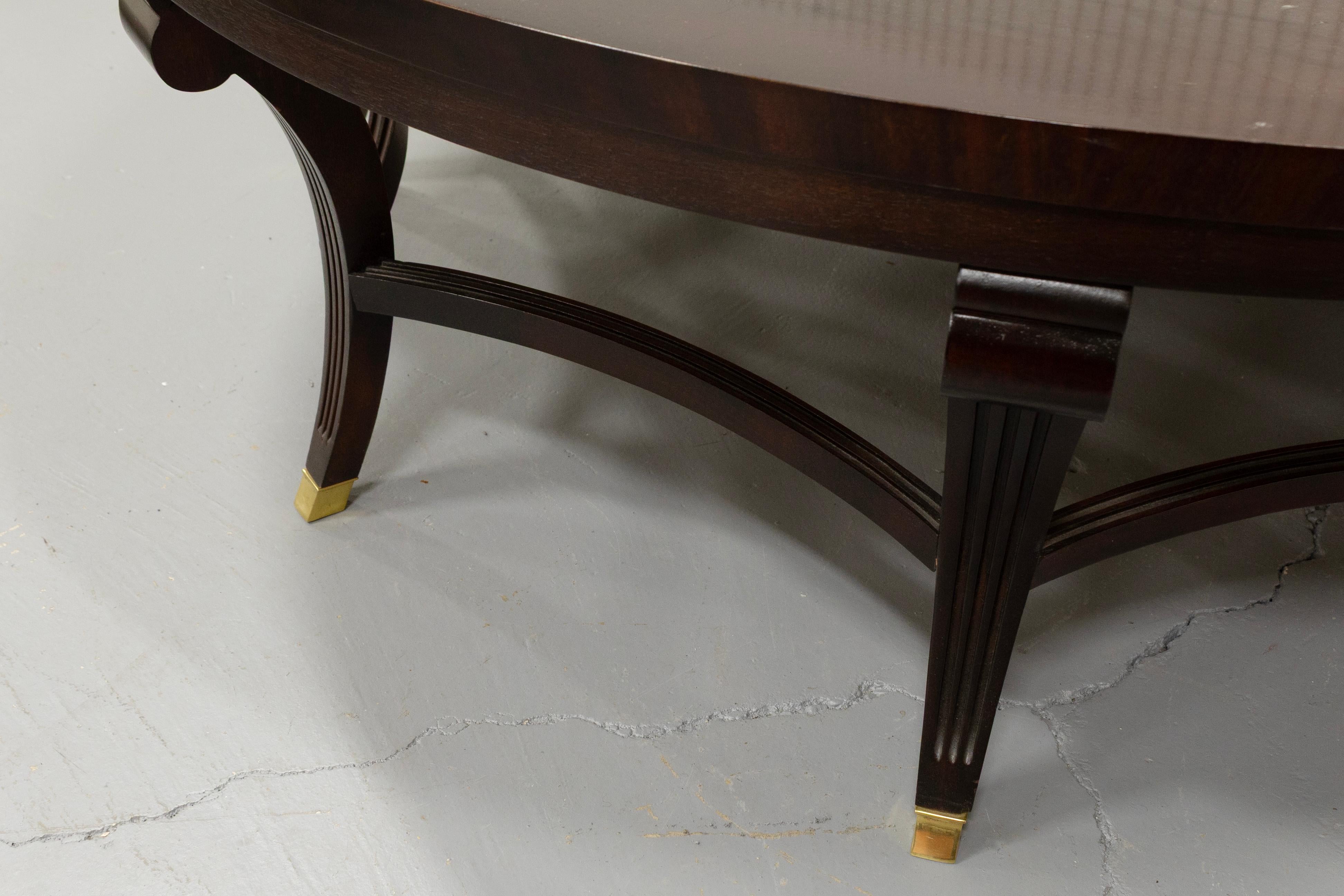 American Hickory Brand Mahogany Large Round Coffee Table With Brass Feet For Sale
