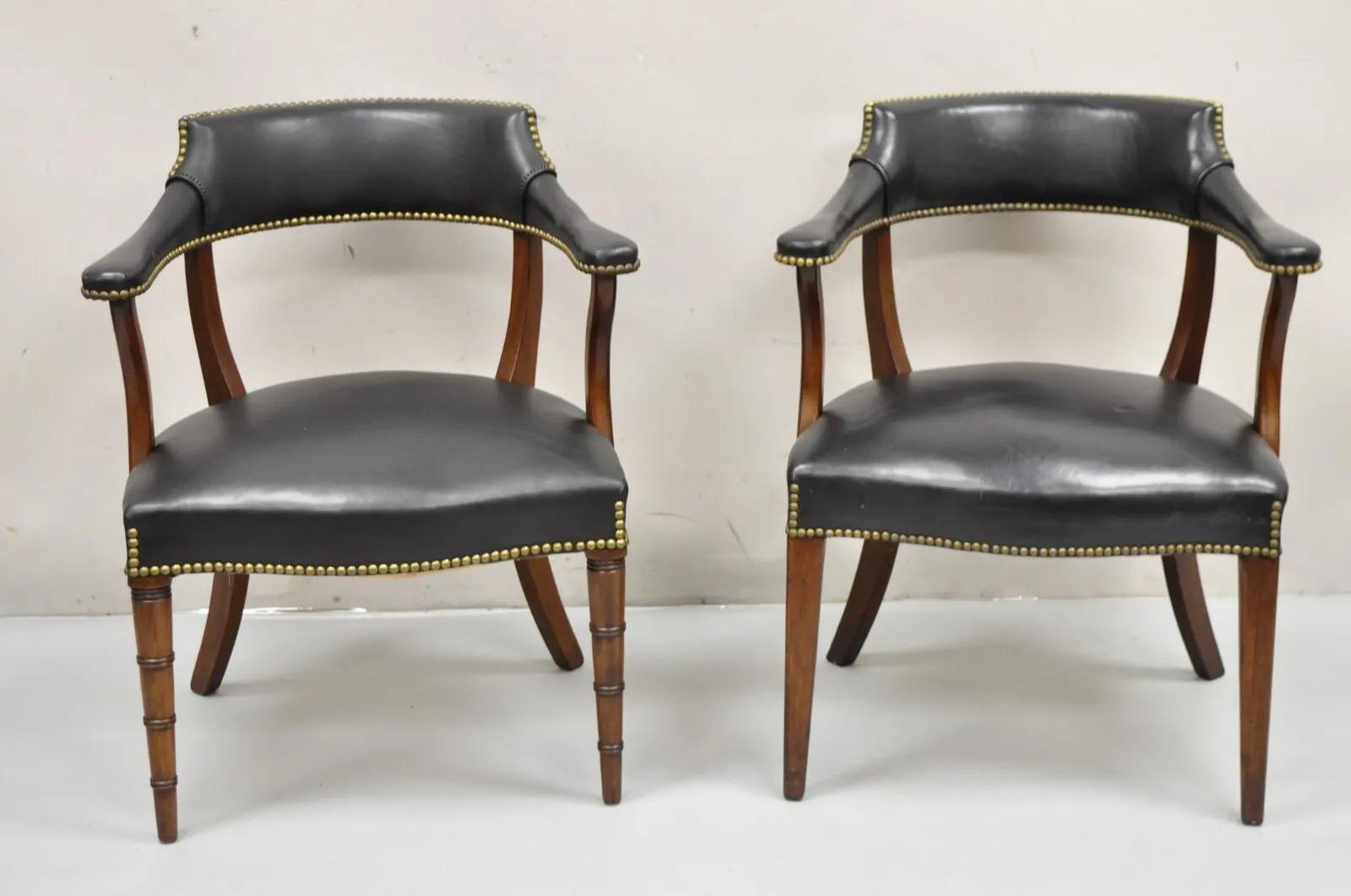 Hickory Chair Co Regency Style Mahogany & Black Leather Club Arm Chairs - a Pair. Item features two comparable chairs with variation in the leg carvings. One chair with faux bamboo carved legs and the other with straight carved legs. Both with solid
