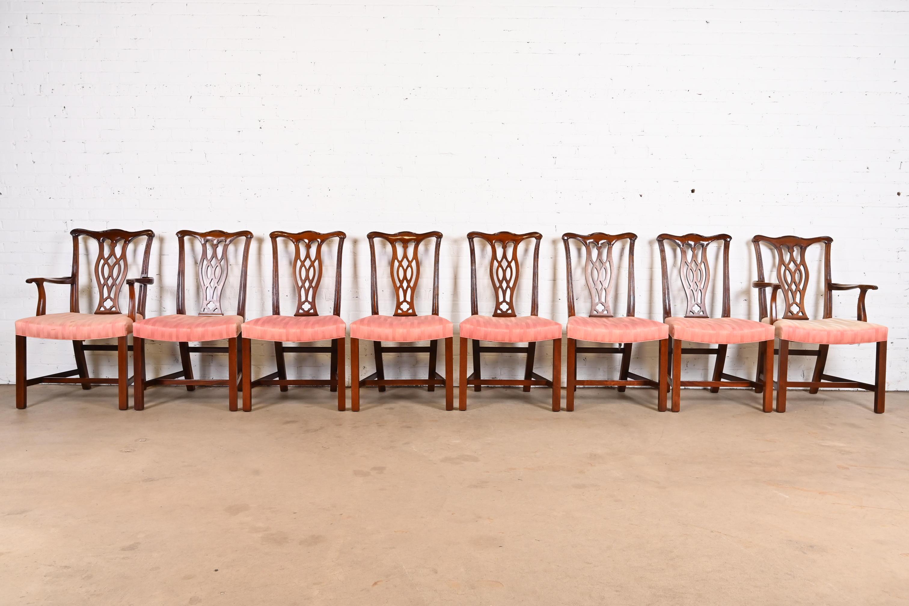 A gorgeous set of eight Chippendale or Georgian style dining chairs

By Hickory Chair

USA, Late 20th Century

Solid mahogany frames, with pink upholstered seats.

Measures:
Side chairs - 21.75